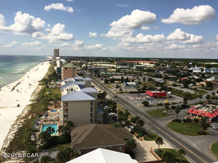 Enjoy one of the resorts with the most amenities in all of Panama City Beach-TIDEWATER! Unit 1201 is one of the nicest furnished 3 bedroom + Bunk Room, 3 bath gulf front condo at this mega-beach resort and priced to sell!! Stunningly excellent 180 degree panoramic views of the sparkling emerald green gulf waters and white sand beaches from sunup to sunrise with wrap-around balcony. Located on the west end of the building, unit 1201 offers 2248 sf of pure comfort. The unit can sleep 10-12 comfortably with a King bed in the Master suite, 4 bunks in the bunk room and a queen size sofa bed in the living area. Completely tiled through-out with carpeting in the bedrooms allow for a clean look and easy care maintenance. Kitchen offers granite counters and a full array of white appliances. Custom draperies and add to the nicely elegant tropical colors and decor. Three full bathrooms for your convenience. Great rental investment property with on-site rental desk. Tidewater is a vacation rental dream with 2 outdoor pools, indoor pool, tiki bar, restaurant, steam/sauna, fitness room, full movie theater, convenience store, beach service, gift shop, covered garage parking and on site rental and assoc. mgt. Located just west of the nearby Pier Park Shopping Mall and all area dining and activities. Unit 1201 at Tidewater is a MUST SEE!