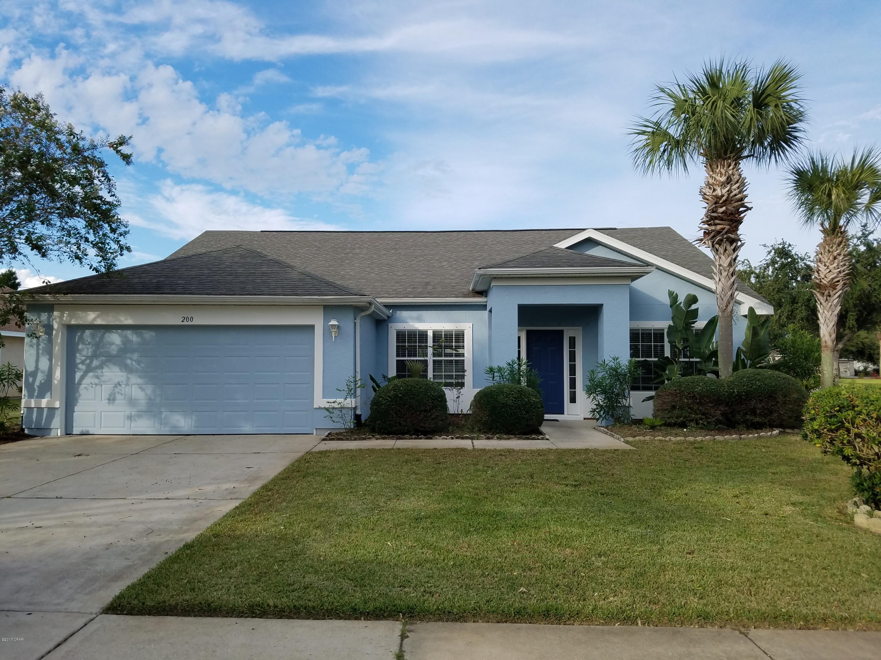 For Lease - Beautifully appointed 4 bedroom, 2 bath home in Palmetto Trace at Pier Park. The home features an open floor plan with the kitchen overlooking the living room and attached breakfast nook area, also a formal dining and sitting area. The kitchen offers stainless appliances, plenty of cabinet/counter space and pantry. Separate inside laundry room attached to the two-car garage. This is a split bedroom floor plan with a master suite/bathroom with separate double vanities and his/her closets. Three additional bedrooms, and bathroom with tub/shower on the other side of the home. Screened patio and beautiful landscaping. Palmetto Trace is a golf cart community with two community pools and sidewalks right next to Pier Park and a 15 minute drive to the ECP Airport.  **Rent includes lawn service, irrigation water and trash. **No Pets allowed.