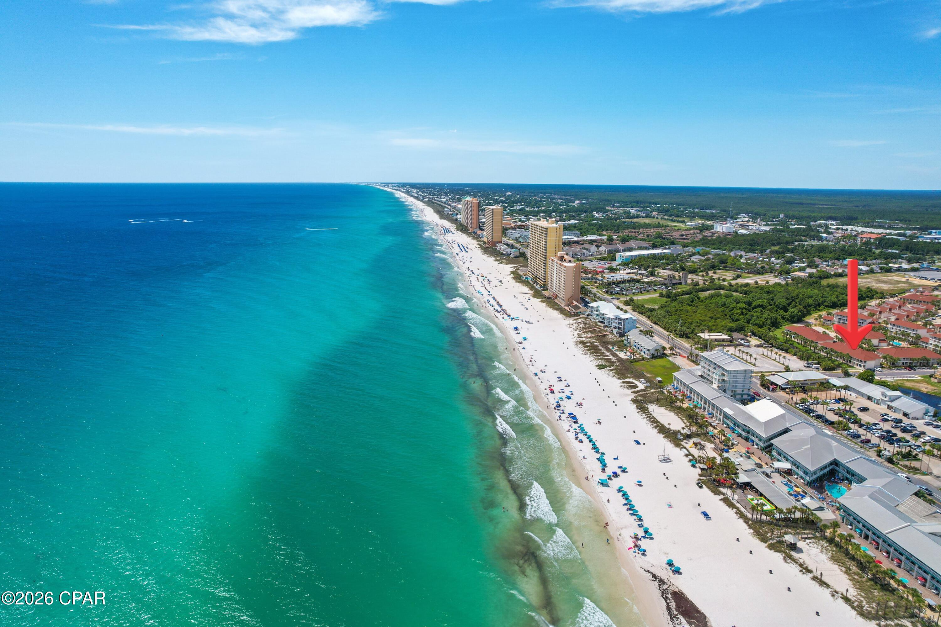 Welcome to Beach Life at Horizon South Unit 60-103, a beautifully located condominium in one of the most desirable gated communities on the west end of Panama City Beach. This 1-bedroom, 1.5-bath unit is one of the closest units to Front Beach Road, providing easy access to the beach, dining, shopping, and entertainment. Whether you're searching for a short-term rental investment, vacation home, or your own beach retreat, this property checks all the boxes.
Inside, you'll find a spacious primary bedroom with an en-suite bathroom and walk-in closet. Built-in hallway bunk beds allow the unit to comfortably accommodate family and guests. The unique Jack-and-Jill style bathroom layout features dual vanities with separate private areas-one side includes a shower and toilet, while the other offers a toilet and sink-providing added convenience and functionality. Enjoy an inviting open-concept layout that seamlessly connects the kitchen, dining area, and living room, creating a bright and comfortable space for everyday living or vacation getaways. The kitchen features a convenient breakfast bar overlooking the living room, allowing you to stay connected while entertaining guests, all while enjoying views of the picturesque pond and water fountain just beyond. Step outside to the covered back patio, the perfect spot to relax with your morning coffee or unwind in the evening while taking in the peaceful waterfront scenery.
Horizon South is known for its outstanding amenities, including gated access, multiple swimming pools, a hot tub and spa area, fitness center, mini golf course, tennis courts, game room, and beautifully maintained grounds. Just minutes from the sugar-white sands of Panama City Beach, local favorites for dining, family attractions, and only a short drive to Pier Park, you'll never run out of things to do.
Enjoy the beach lifestyle, investment potential, and welcoming atmosphere that make Horizon South one of Panama City Beach's most popular resort communities. All measurements are approximate; buyer to verify if important.