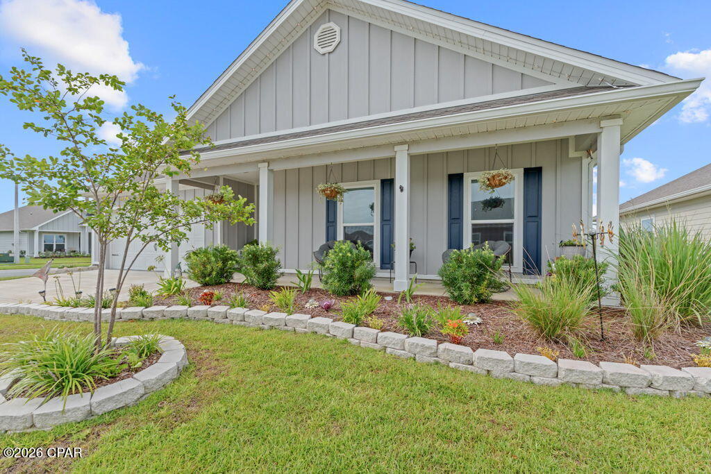 VA ASSUMABLE LOAN WITH A 4.99% INTEREST RATE! Welcome to the most popular floor plan in Titus Park (The Victoria!) This immaculate 4 bedroom, 2 ½ bath home is truly BETTER than new construction with upgrades already done for you. As you walk in, you'll immediately notice the upgraded light fixtures that add so much character throughout the home. To the right are three spacious guest bedrooms, the guest bathroom, and the laundry room. The open-concept living area is filled with natural light, making the space feel bright and inviting. The living and dining room windows are even equipped with remote-controlled blinds! The kitchen features granite countertops, stainless steel appliances, a beautiful tile backsplash, and a large pantry with plenty of storage. On the opposite side of the home, the primary suite offers plenty of privacy. The ensuite bathroom includes a double vanity, soaking tub, separate shower, private toilet room, and a huge walk-in closet. The backyard is what makes this home EXTRA special. You'll love the extended paver patio, complete with walkways on both sides of the home and a screened-in porch that's perfect for enjoying your morning coffee or winding down in the evenings. Both the patio and garage floors have been professionally finished with epoxy coating that comes with a lifetime warranty. When you're ready for a refresh on those hot Summer days, Titus Park is also home to a COMMUNITY POOL and Dog Park for owner-use! Titus Park sits in a PRIME location with shopping and restaurants directly across HWY 390. Enjoy Publix, McDonalds, a Gas Station, and Starbucks all within walking distance of your home! This home is also only 10 miles to Tyndall AFB, 3 miles to Lynn Haven, and 8 miles to Panama City Beach!