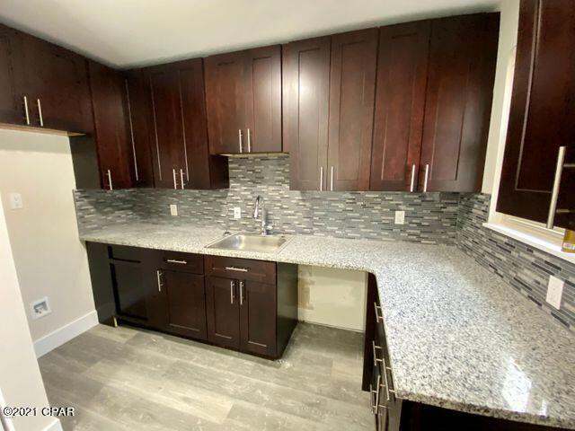 Come check out this newly renovated duplex! Pleasantly located near Saint Andrews Bay and down the road to the Downtown area. New paint, new flooring, new roof and updated bathrooms and kitchen. Affordable price and in the hearth of it all.... Don't miss your chance on this beautiful place to live and reach out to us today!