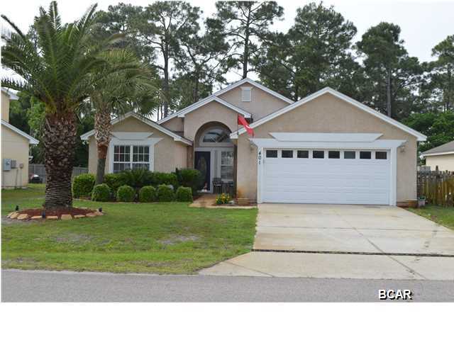 Popular Hidden Pines subdivision! The 3/2 split floor plan is well maintained and spacious. The home has a nice open living/kitchen area with an island in the kitchen along with stainless appliances. The master bedroom is spacious and has a private exit to the fenced back yard. The Master bath has a separate vanity area and a walk in closet. The fenced back yard features pineapple plants and a lime tree. The yard also has a well for irrigation. You are just steps away to the walking trail! (This is a short sale. Please allow 60 days for short sale approval and approximately 30 days to close after approval. Price is subject to lender approval).