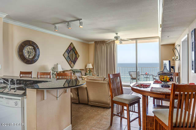 A Full 150 square feet of private balcony accessible from your Gulf front master bedroom and living area!! Popular ''Type L'' floor plan, unit 1112 is not too low, not too high! This tastefully decorated 1 bedroom, 2 bath includes a bunk room, giving the unit that 2 bedroom feel and quality. Gulf front condo is fully equipped for rentals and has a long rental history. Capture the rest of the high rental season as soon as you close! The unit features ceramic tile throughout and the kitchen includes granite counter tops, stainless steel double sink, loads of cabinet space and is fully stocked and rental ready. Tidewater Beach has 636' of gulf frontage and a wide variety of amenities. The location near Pier Park and the airport make this property the place to be! Two huge lagoon pools on each side of the building, a fully enclosed indoor pool for those rainy days, a 4200 sq. ft. Fitness Center for the fitness buff, Owner's sky lounge, and a 5000 sq. ft. Convention Center to attract meetings and guest revenues. Flip Flops on-site coffee/snack shop, Waves bar and grill, large lobby and check-in area all add up to the ultimate destination for you and your guests!