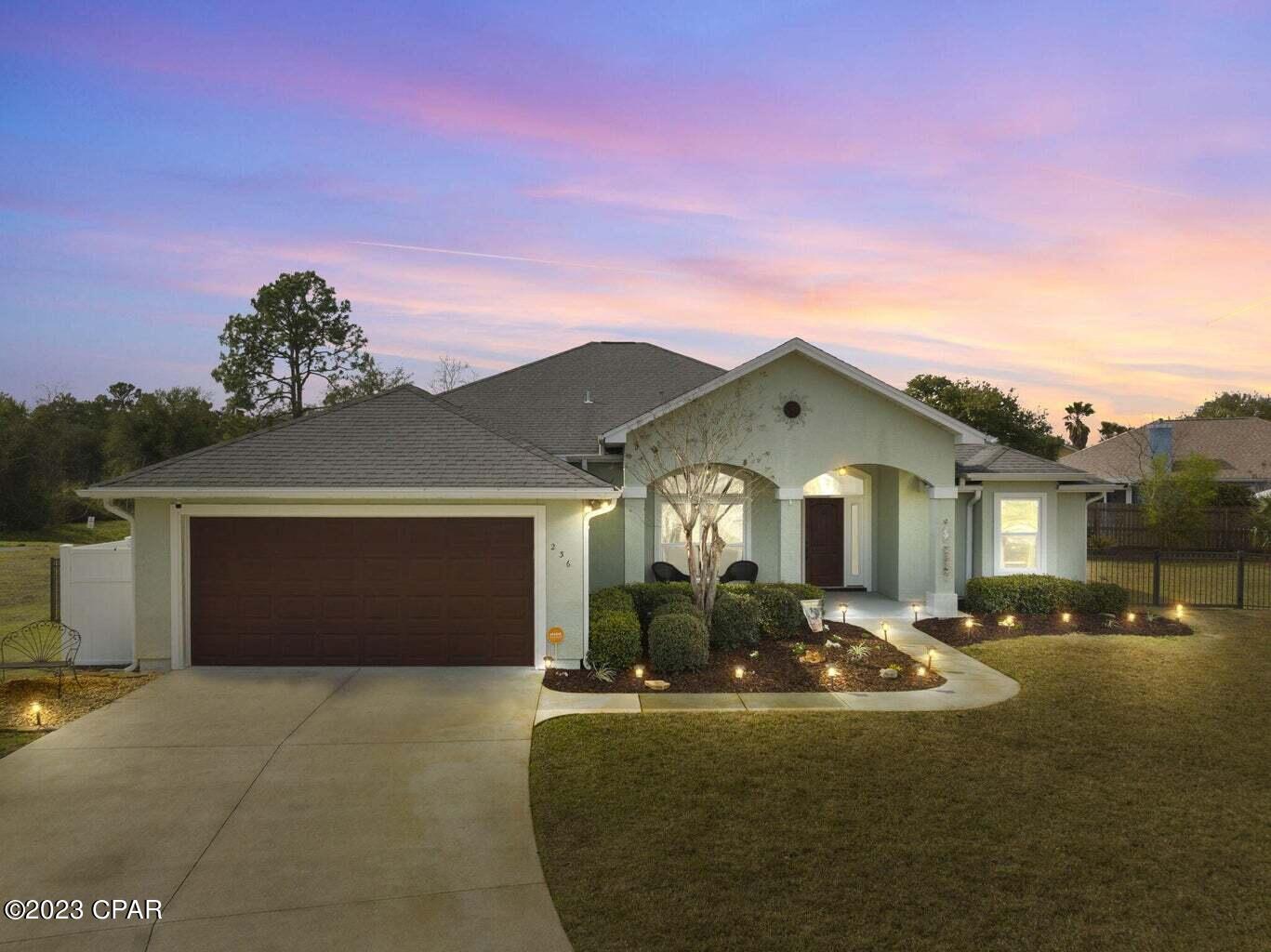 Nestled on a quiet cul-de-sac in the desirable Summerwood neighborhood, this spacious 4-bedroom, 2 bath home is located w/in 3 blocks to our beautiful emerald-blue waters & white sandy beaches & just a half a mile to Pier Park in Panama City Beach. Home highlights include: a peaceful enclosed sunroom, 10 ft. ceilings, french doors, hard wood flooring, crown molding. Natural light fills the rooms along with coastal-inspired, updated lighting fixtures throughout. The craftsman-style kitchen offers plenty of cabinet storage along with the pantry. Enjoy cooking in this beautiful kitchen, equipped with stainless steel appliances, & plenty of granite counter space. The kitchen is open to the living room from the breakfast bar which flows out to the sunroom. The split floor plan is perfect for