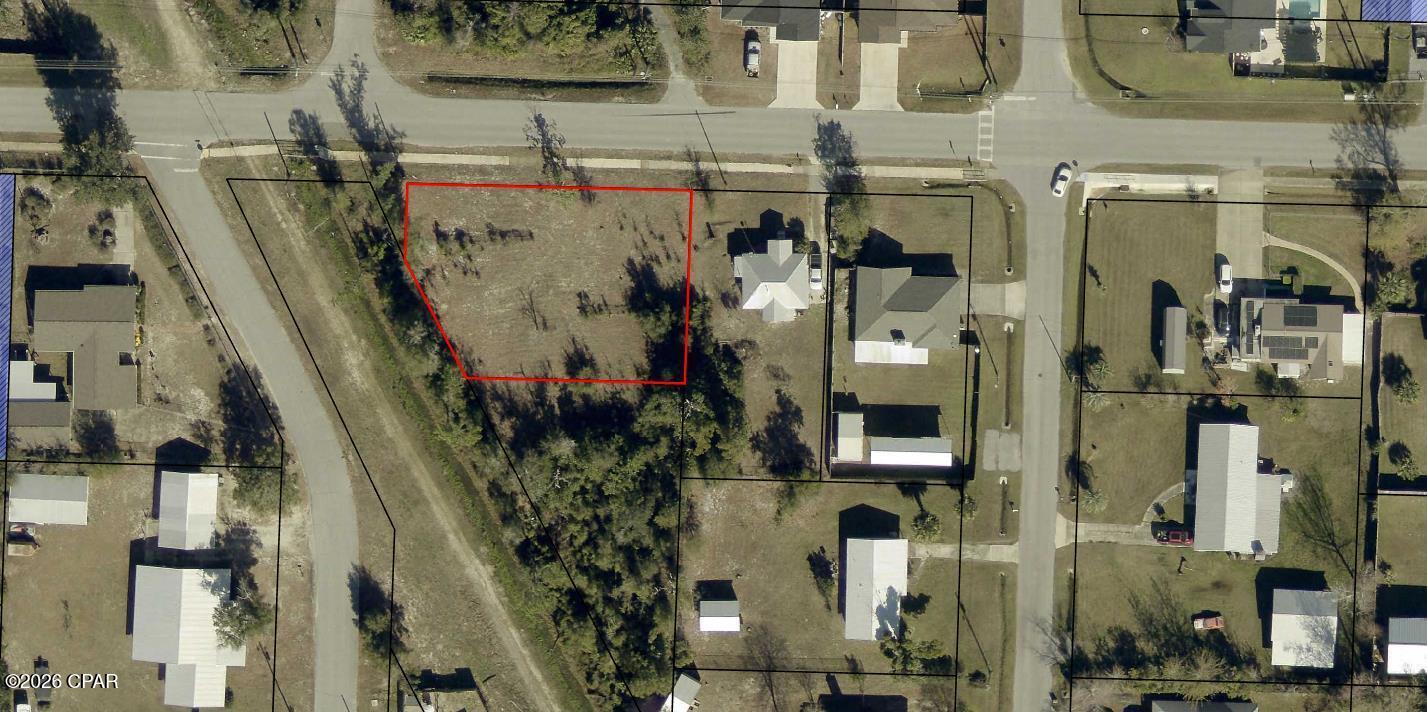 This sale includes two parcels .566 TOTAL ACRES. Here is your chance to secure a truly rare opportunity in the heart of downtown Lynn Haven. Parcel #09979-0 00-000 (0.303 acres) and Parcel #09978-0 20-000 (0.258 acres) are adjoining parcels to be conveyed together at closing, totaling approximately 0.561 acres  of residential land within the city limits.

Properties of this size in this location do not become available often. With approximately 13,199± sq. ft. and 11,456± sq. ft., respectively, these two lots together provide the space and flexibility to design and build with room to breathe whether you envision a custom home, additional garage space, outdoor living, or simply enjoying the extra yard space that is increasingly hard to find in Lynn Haven.

Located on 12th Street, you are right in the middle of a neighborhood experiencing steady growth and new residential development. Enjoy being just steps from schools, shopping, parks, and everything Lynn Haven has to offer while still having the privacy and elbow room of over half an acre. These two parcels already have sewage and water taps all it needs is you! 

This is the kind of in-town acreage buyers wait for, and it doesn't last.

All measurements, dimensions, acreage, zoning, and lot boundaries are approximate and should be verified by the buyer.