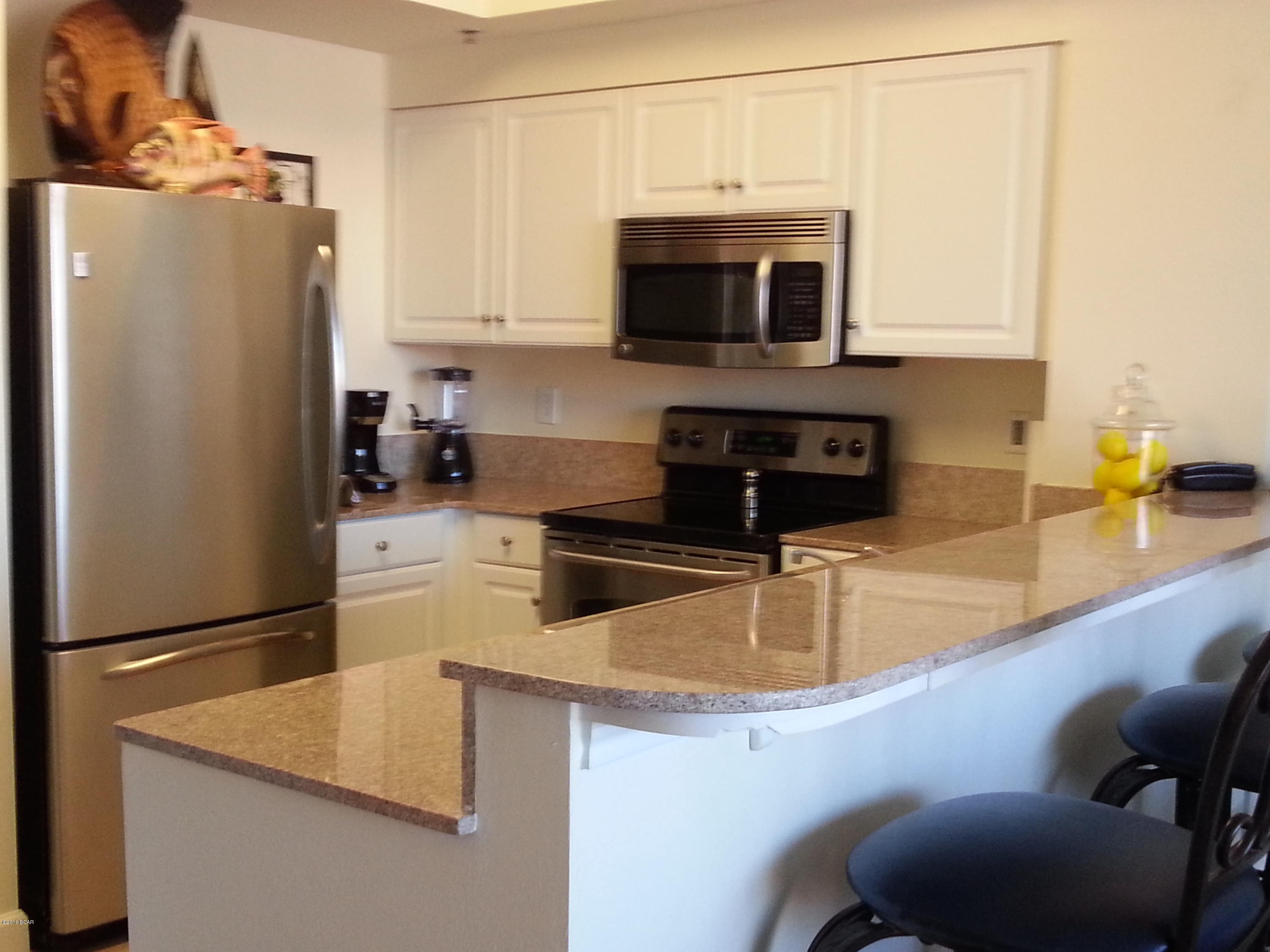 ><>< OWNER FINANCING AVAILABLE ><>< Enjoy beautiful Gulf views and sunsets  from this top floor level one-bedroom, two full bath condo, plus a bunk room that can easily be closed off to create a small second bedroom. Designed to sleep 6. Enjoy Gulf breezes from the balcony that overlooks the tropical Las Vegas style lagoon pool with lush exotic landscaping. The unit has new commercial grade carpet w/10 yr warranty and will be sold fully furnished. Assigned deeded parking space available for sale, price negotiable. You'll notice the difference the moment you arrive at this complex, featuring a Mediterranean style drive-in entranceway, arriving at the grand lobby & reception area where you enter a Venetian dome to check-in, meet with your friends & relax.