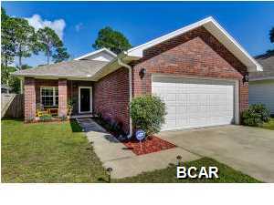 Move-in ready, carpet free home located in the center of Niceville. This 3 bedroom, 2 bath all brick home offers two living areas and split floor plan. Family room is accented with corner gas fireplace open to large kitchen with granite countertops, center island and French style Fridge with water and ice in the door. Perfect floor plan for entertaining as living space is extended through the glass slider doors to the screened in back patio. The exterior features include 6-ft privacy fenced backyard, sprinkler system, rain gutters, two-car garage and large shed/man cave. This home is just a short commute to Eglin AFB, Duke Field, Destin and the world's most beautiful beaches. A must see for anyone looking for a comfortable, low maintenance place to call home. Schedule your showing today!