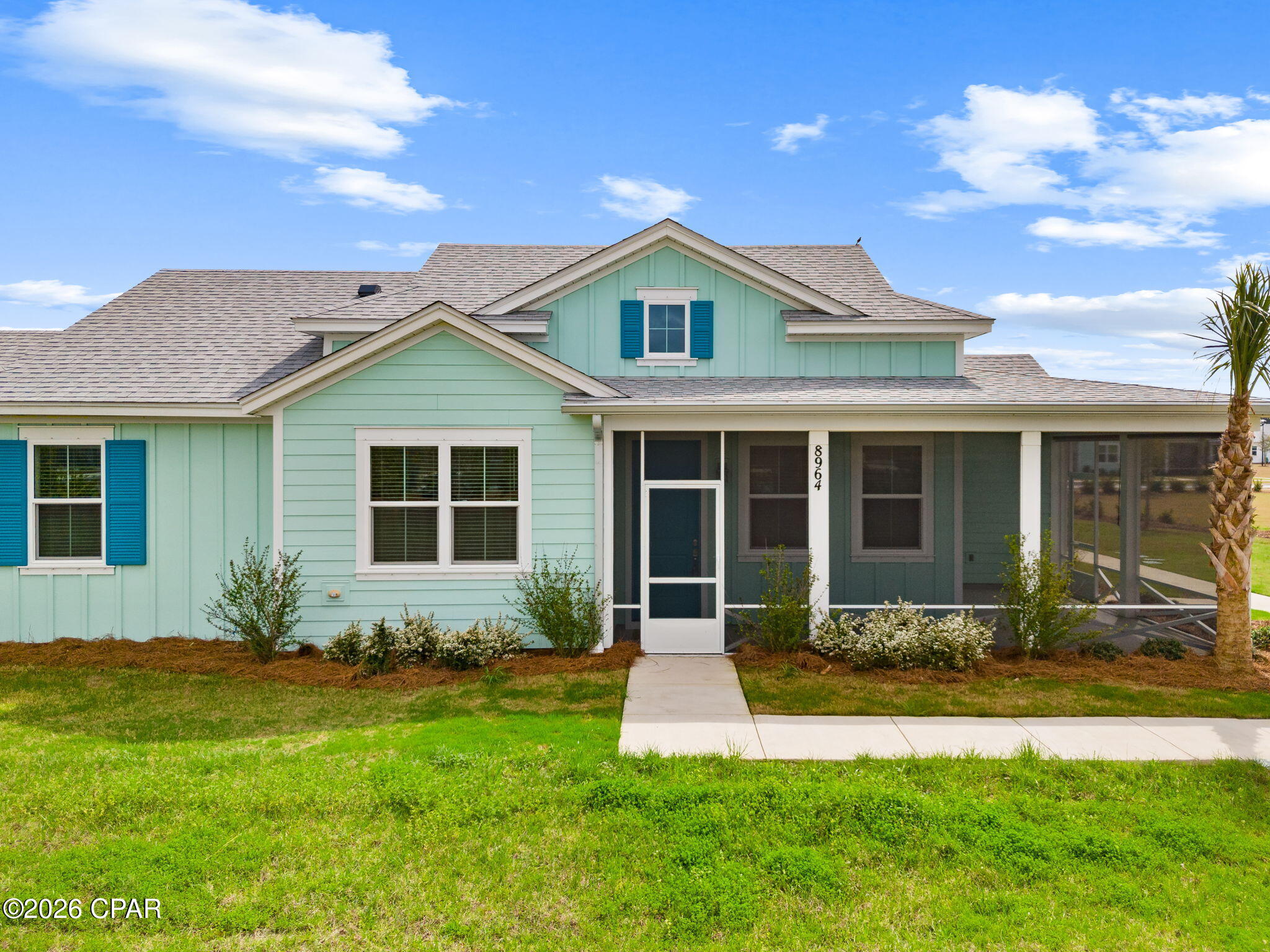 POPULAR DREAMSICLE FLOOR PLAN WITH PRIVATE FRONT AND SIDE YARDS. Large end unit with wraparound porch has tranquil sunset views over beautifully-landscaped green space! Each window provides a private view - no overlooking the neighbors' homes here. Ideally located close to Town Square with walking trails providing a shortcut to the amenities, in the fun and social phase 6BC. Walk to Flip Flop Square, the gathering place for this phase, where weekly meet-ups and special events occur. Nearby West Bay Center, including our new Publix grocery is already under construction and a quick golf cart ride away. This perfectly upgraded home features an inviting open-concept great room highlighted by a Margaritaville-style beamed ceiling. Numerous upgrades including cool tile flooring throughout, decorator pendant lighting, granite countertops, upgraded cabinetry with soft close drawers, designer paint and wallpaper accents. Additional highlights: Wraparound screened porch with additional retractable shade. This exceptional home offers a rare opportunity to enjoy a move-in-ready cottage in one of Latitude Margaritaville Watersound's most desirable locations--just steps from the community's celebrated amenities, events, and lifestyle. A perfect primary, second home or investment property ready for immediate occupancy. Living in Latitude Margaritaville Watersound means embracing a true resort-style, active adult 55+ community, coastal lifestyle designed for fun and relaxation. At the heart of it all is the Town Square where live entertainment fills the air each afternoon plus every Fri/Sat night! Homeowners enjoy the Resort-style pools - perfect for lounging in the Florida sunshine or enjoying a swim with friends. State-of-the-art fitness center & group classes - including yoga, spin classes and lap pool and spa, water aerobics to name a few. Walking, biking, and golf cart trails that wind through the community with easy access to all amenities and a underpasses for safe and convenient access throughout the neighborhood.