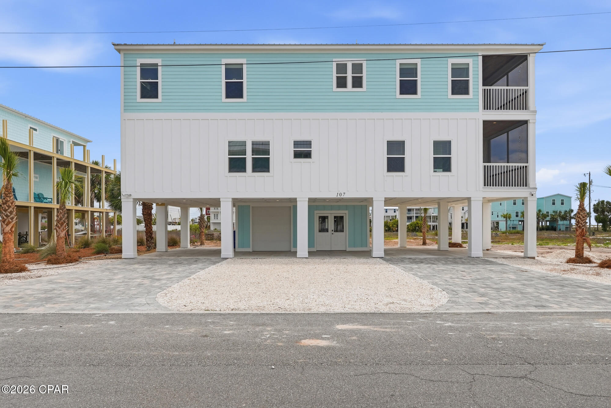 Discover coastal living at 107 Circle Drive, a custom-built, single-family residence located on the coveted beachside of Hwy 98 in Mexico Beach. This thoughtfully designed home has 4 generously sized bedrooms, 3-bath at approximately 3,368 square feet of living space, about 300 steps from the sugar-white sand and emerald waters of the Gulf. Designed for both full-time living and a low-maintenance beach retreat, the home features multiple living areas ideal for relaxing, entertaining, or working remotely. The efficient floor plan balances privacy and connection, while abundant natural light and Gulf views from many rooms enhance the home's beachside setting. The beautifully appointed kitchen features custom wood cabinetry and Frigidaire Gallery appliances, large laundry room with custom wood cabinetry. This custom-built single-family residence offers the privacy and flexibility today's coastal buyers are looking for -- no shared walls, no attached neighboring homes, and no HOA fees. Located on desirable Circle Drive in Mexico Beach positioned on one of the few quiet streets, this home is conveniently located removed from Highway 98 and still tucked away from road noise. Perfectly situated behind the marina, it offers peace, privacy, and that relaxed beachside feeling -- a true slice of coastal heaven. While short-term rentals are permitted, the area maintains a quieter coastal atmosphere that appeals to full-time residents, second-home owners, and vacation buyers alike.
This home offers enhanced storm resilience, covered parking, and dedicated storage areas. 
Built to current Florida coastal construction standards, the property also features impact-rated windows and sliding glass doors, elevated construction, a durable coastal-grade roof, covered parking with a garage door for golf cart storage, an outdoor shower, and convenient storage for beach and boating essentials.
Inside, the home features custom hardwood cabinetry in the kitchen and laundry room, along with upgraded closet systems throughout. Energy Star-rated systems and a tankless hot water heater with an instant recirculating hot water pump provide energy efficiency and near-instant hot water throughout the home. Positioned on one of the few streets in Mexico Beach that is not a straight front-to-back roadway, the property offers added ease for maneuvering boats, trailers, and golf carts. 

For all boaters out there, the City of Mexico Beach owns and rents out the Canal slips down the street. These slips are 12 feet wide, fitting almost all fishing boats, including boats with upper stations and towers. Call today!
Mexico Beach is beloved for its sugar-white sand, emerald water, and laid-back "Old Florida" charm without the crowds, high-rises, or heavy traffic found in larger beach destinations. The vibe is less "tourist hotspot" and more "coastal escape," where mornings begin with beach walks, afternoons are spent boating or fishing, and sunsets become part of your daily routine. 
Families, second-home owners, and vacation renters are drawn here for the slower pace, beautiful beaches, and strong sense of community. 
Conveniently located, Mexico Beach also offers easy access to Port St. Joe, Panama City, for dining, shopping, entertainment, and travel convenience.
Square footage does not include the additional 430 sq. ft. heated and cooled entry mudroom/flex space. This versatile area could serve as a game room, kids' hangout, sectional lounge, home gym, or golf cart garage.
DISCLOSURE: Digital photography and staging have been used to showcase a possibilities of a pool, landscaping, and interiors. 
Pool design is also available, offering the opportunity to further elevate this exceptional coastal property.