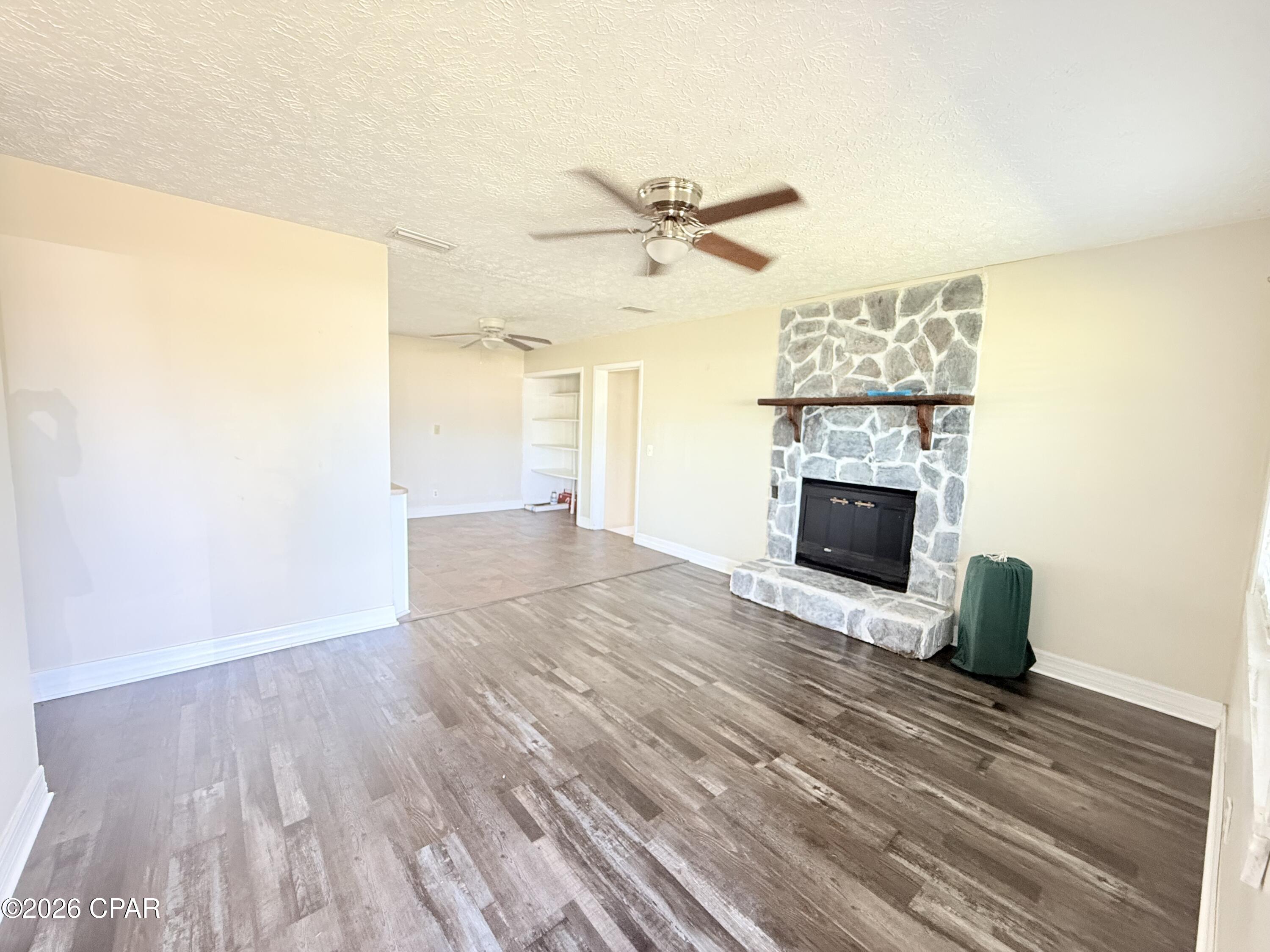 Welcome to this beautifully updated home in the desirable St. Andrews area of Panama City. This property combines modern upgrades with functional living, making it a standout option for comfort and convenience.

Inside, you'll find new luxury vinyl plank (LVP) flooring throughout, offering both durability and a clean, modern look. The kitchen is designed with soft-close cabinets, providing a high-end touch and everyday ease. A cozy fireplace adds warmth and character to the living space, perfect for relaxing evenings.

The home features a thoughtfully designed bathroom with a stylish barn door, adding both charm and privacy. Acoustic ceiling tiles enhance sound control, creating a quieter and more comfortable indoor environment, while tile flooring in key areas adds practicality and easy maintenance.

Step outside to a fully fenced backyard, ideal for pets, entertaining, or simply enjoying your own private space. The fire pit area creates the perfect setting for gatherings or unwinding at the end of the day.

For connectivity, the home has access to WOW! Fiber internet with 1 Gig speeds available for approximately $45/month, making it ideal for remote work, streaming, or gaming.

This home offers a balance of style, functionality, and value in a convenient location close to shopping, dining, and local amenities.

Receive $500 off your first month's rent with a move-in on or before May 15, 2026.