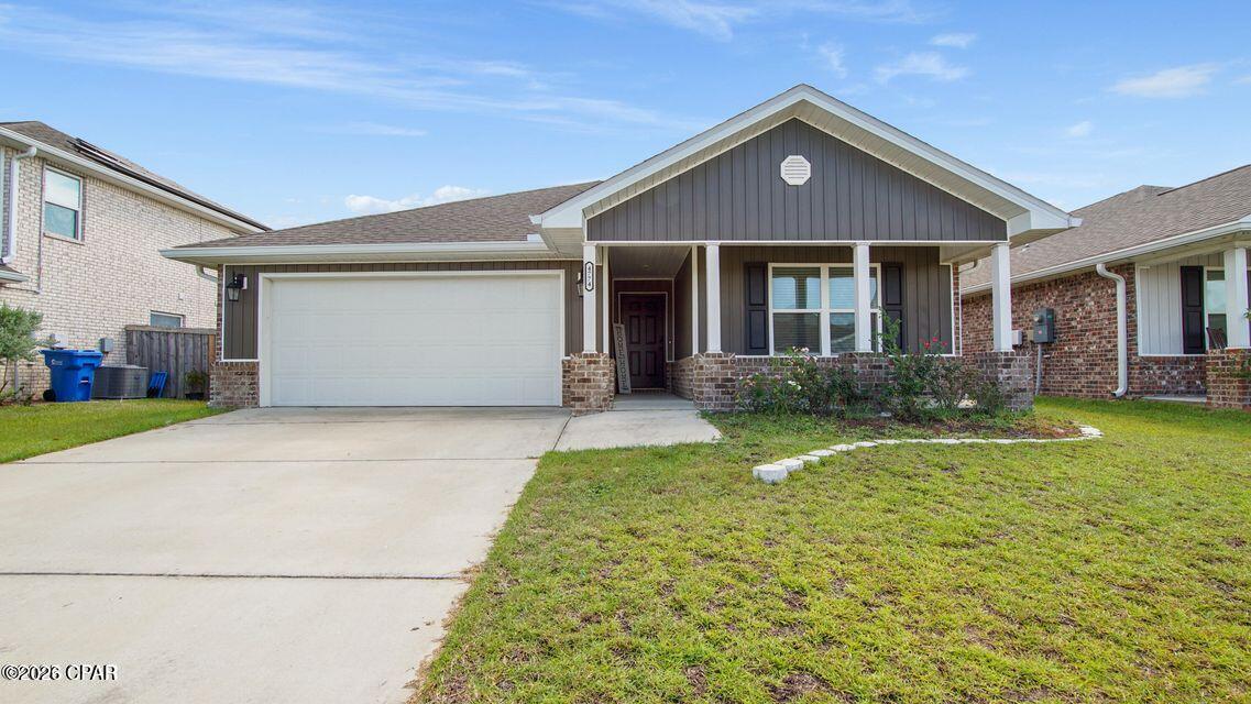 Beautiful 4 Bedroom Home in Sought-After Titus Park! Welcome to your dream home in Titus Park— one of Panama City's fastest-growing and most desirable communities! Built in 2021, this spacious 4 bedroom, 2 bathroom home offers nearly 2,100 sq. ft. of modern living space with an open-concept design perfect for both entertaining and everyday life. Prime Location: Just off Highway 231, you'll enjoy easy access to Tyndall Air Force Base (15 miles) and the sugar-white beaches of Panama City Beach (17 miles) Interior Highlights: Bright, open floor plan with natural light Modern kitchen with plenty of counter space Large primary suite with walk-in closet and private bath Three additional bedrooms which is ideal for family, guests, or a home office Additional Features: 2-Car Garage Covered Back Porch — perfect for morning coffee or evening relaxation Fully Fenced Backyard — great for pets and entertaining Access to a brand-new neighborhood pool & amenities New Publix shopping center right across the street, plus Starbucks and more just minutes away Value Flooring replacement has already been started. It will need some finishing to include some baseboards and trim as well as carpeting replacement in some bedrooms. This has been reflected latest price adjustment. Energy Savings: Solar panels already installed! Current owners enjoy power bills typically under $30/month (solar lease payment approx. $177/month, transferable to buyer upon qualification). Don't miss your chance to own this gem. Schedule your private showing today!
