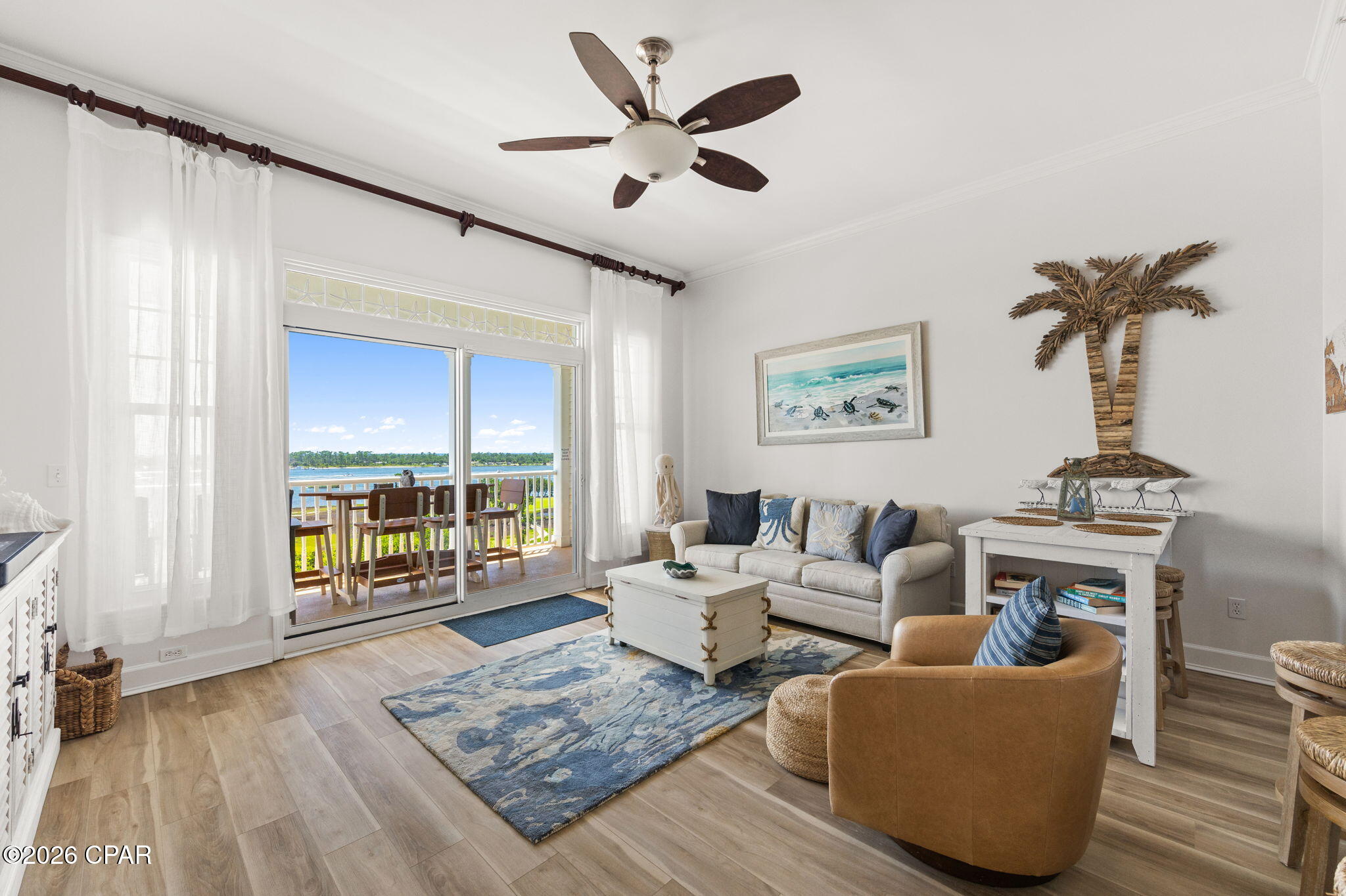 Experience elevated coastal living from the 7th floor of Reflections at Bay Point in this beautifully furnished 1-bedroom, 1-bath residence. Enjoy breathtaking views from your private balcony overlooking the Pass, Grand Lagoon, St. Andrews State Park, partial Gulf waters, and the resort-style pool below. Inside, you'll find a spacious open-concept layout filled with natural light, featuring recessed lighting, LVP and tile flooring, and direct balcony access from the living area. The primary bedroom offers elegant tray ceilings, while the bathroom features a double vanity and walk-in shower.Reflections at Bay Point offers exceptional resort-style amenities, including a lagoon-style pool, heated pool, hot tub, two fire pits with gathering areas, and gas grilling stations. Located within the highly sought-after gated Bay Point community, residents enjoy access to a world-class marina, championship golf, and the renowned Nicklaus Course. On-site dining is available at Neon's Bar 72, serving food and drinks daily. Whether you're seeking a primary residence, vacation getaway, or investment opportunity, this property offers the perfect blend of luxury, convenience, and waterfront living in Panama City Beach.