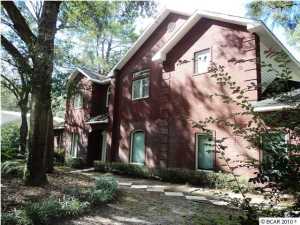 PRICED TO SELL! Sophisticated Country Living in the beautiful High Point area of Deer Point Lake. Boating, water skiing, and freshwater fishing are right in your back door! Two story, all brick home on lovely landscaped .73 acre lot with numerous shade trees and limited view of Deer Point Lake in one of THE most lovely and serene areas of the Deer Point area. And only minutes to Tyndall AFB, Naval Coastal Systems, Pier Park, Panama City Mall, schools, shopping, restaurants and medical facilities. Three large bedrooms and a home office that could easily be used as a fourth bedroom. Entering this lovely home the front foyer has a 22' ceiling, tile inlays and is graced with a columned archway that leads into the formal sitting room and dining room. The formal dining area has trey