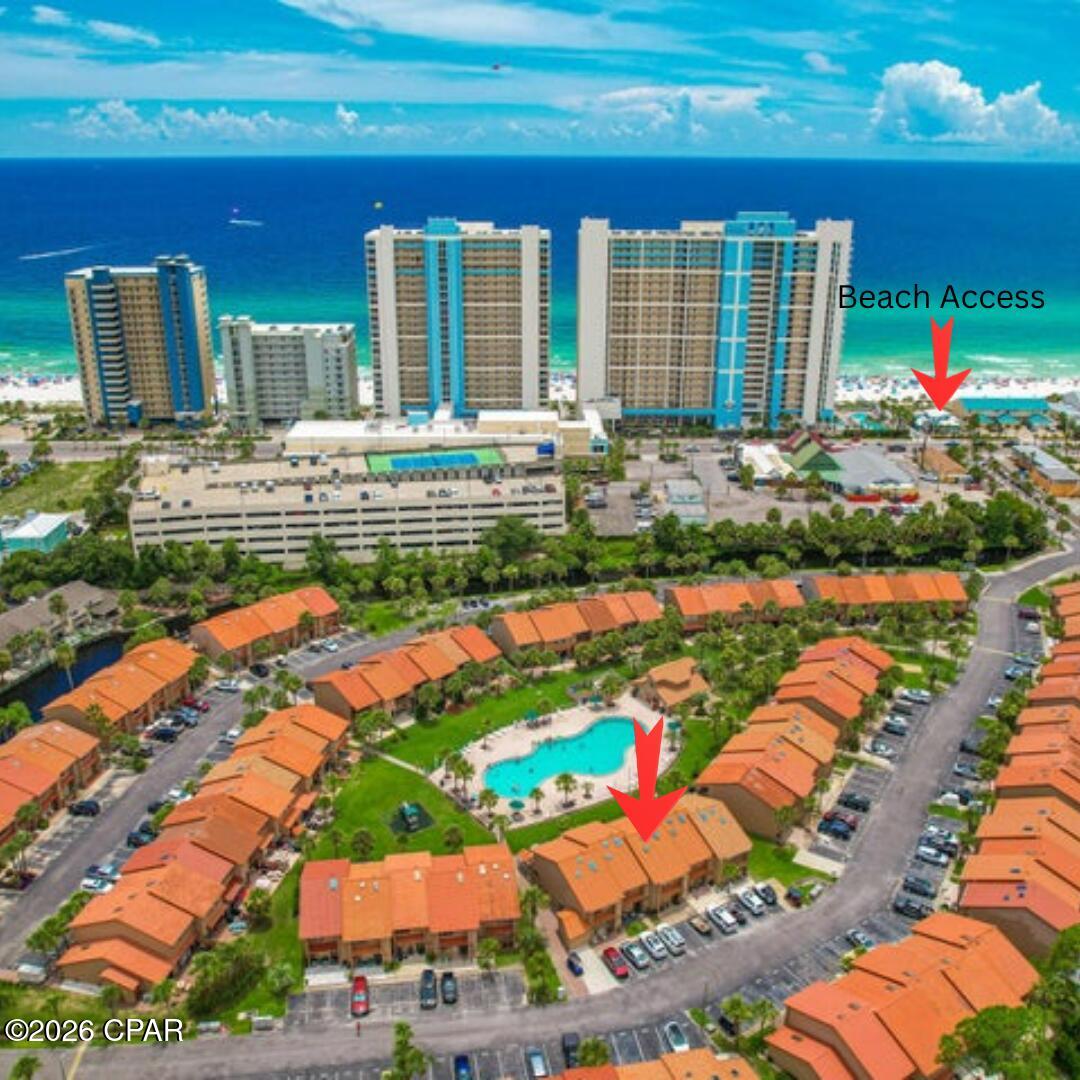 Under Contract. Seller will consider back-up offers. JUST A FEW SHORT STEPS to the warm white sands and cool blue waters of Panama City Beach! NEW ROOF and skylights installed January 2020! This lovely Gulf Highlands Beach Resort townhome is fully furnished and ready for your family! Park directly in front of your unit in the two dedicated parking spots. No elevators to maneuver with groceries or beach toys! The large, open floor plan, full-sized kitchen with an oversized breakfast bar and abundant cabinet and counter space makes this the ideal place for friends and families to gather. The living area features sliding glass doors which lead to a lovely patio area and the largest swimming pool in the resort. Gulf Highlands offers an array of amenities including 11 swimming pools (5 heated), 3 tennis courts, pickleball, fitness center, mini-golf, 2 playgrounds, shuffleboard, conference center, and a private clubhouse featuring restaurant and pool overlooking the Gulf. Numerous entertainment options are available within walking or golf cart distance, including Rock'it Lanes Bowling/Skating/Arcade, Just Jump Trampoline Park, Shipwreck Island Water Park, Ripley's Believe it or Not, Wonder Works, fishing pier, shops, restaurants, bars, and more. This secure, golf cart-friendly resort offers an ideal environment for short-term renters and full-time residents alike. This unit is not on a rental program at this time, but it has a projected annual rental income of over 40K. The low HOA fees cover all amenities, including trash, internet, landscaping, pool servicing, and termite & pest control. At Gulf Highlands Beach Resort, every season is Beach Season! Age, Sq Ft, and dimensions approximate.Age, SF, and dimensions approximate.