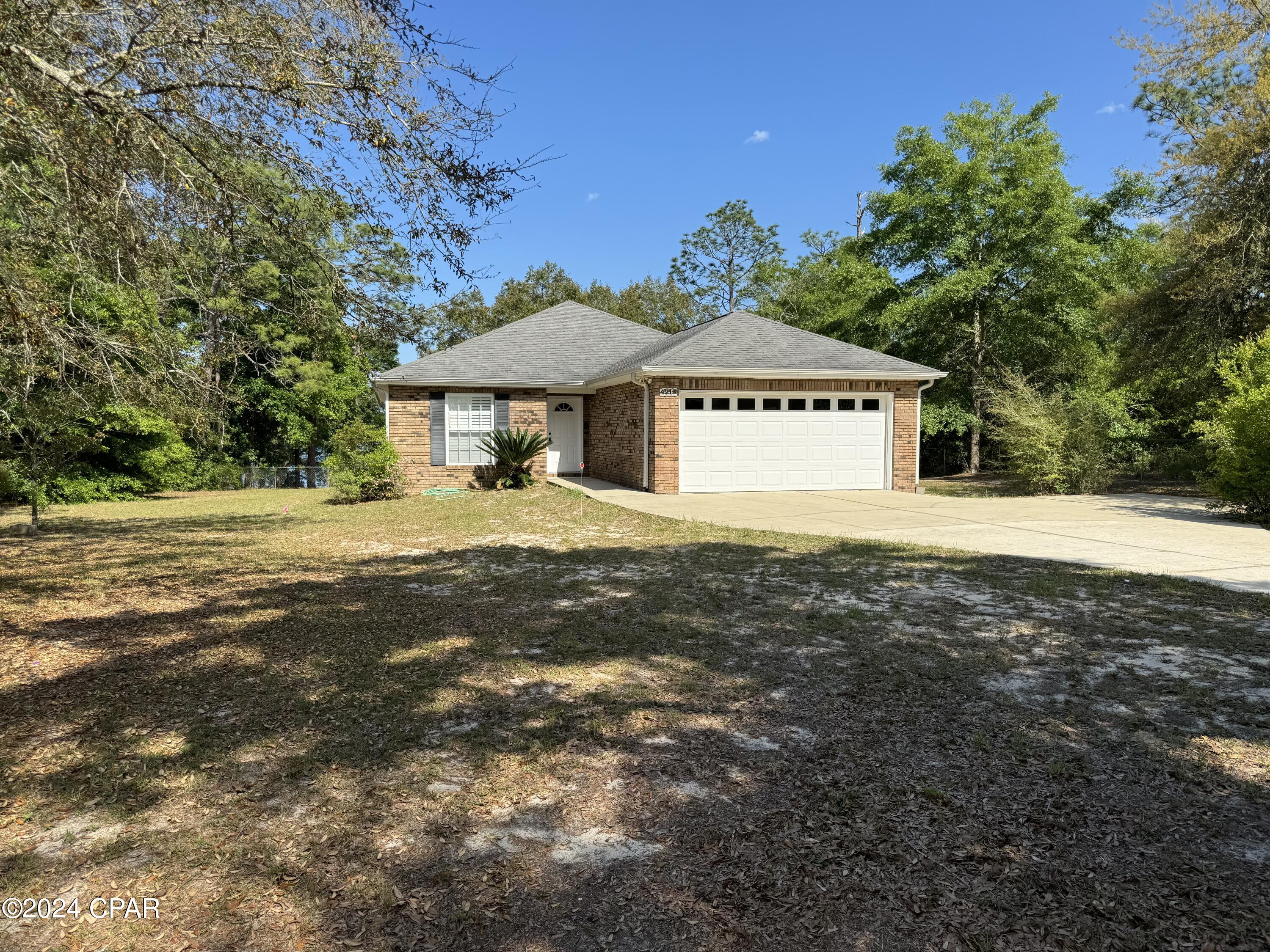 This nice Leisure Lakes waterfront home is for lease. If you are looking for a real nice rental house north of Panama City this is it.
Leisure lakes is a gated community located north of Bay county. This nice house is waterfront with beautiful lake front view of leisure lake. This property boast a real nice fenced in yard for your pet and a separate garage to store all your stuff. This is a 3 bedroom 2 bath home with a nice deck on the back. There is a community pool , basketball court club house. Pet welcome. Qualified tenants. Background check is required