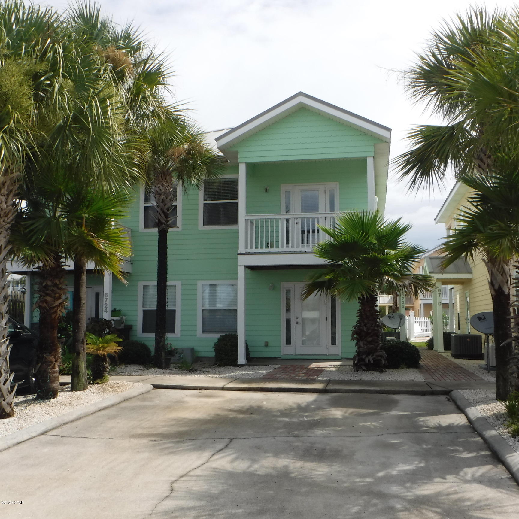 Luxury Gulf View Townhome, close to Navy base and just steps to the Gulf and beach, including Community Pool!  New Paint & carpet - not represented in the current pics.  The balconies on the second floor with patios on the first floor overlook the Gulf and the Pool. Large open Kitchen with lots of cabinets and Corian Countertops with large walk in pantry! 12' ceilings upstairs really make the space feel expansive!  There is a convenient 1/2 bath upstairs so you don't have to use the stairs. Both bedrooms downstairs are Master Suites. One Master has Tub/shower combo and the other Master bedroom bath is luxurious and large, marble lined shower with a seat. Both bedrooms have large walk in closets. Inquire today!  This won't last long!
