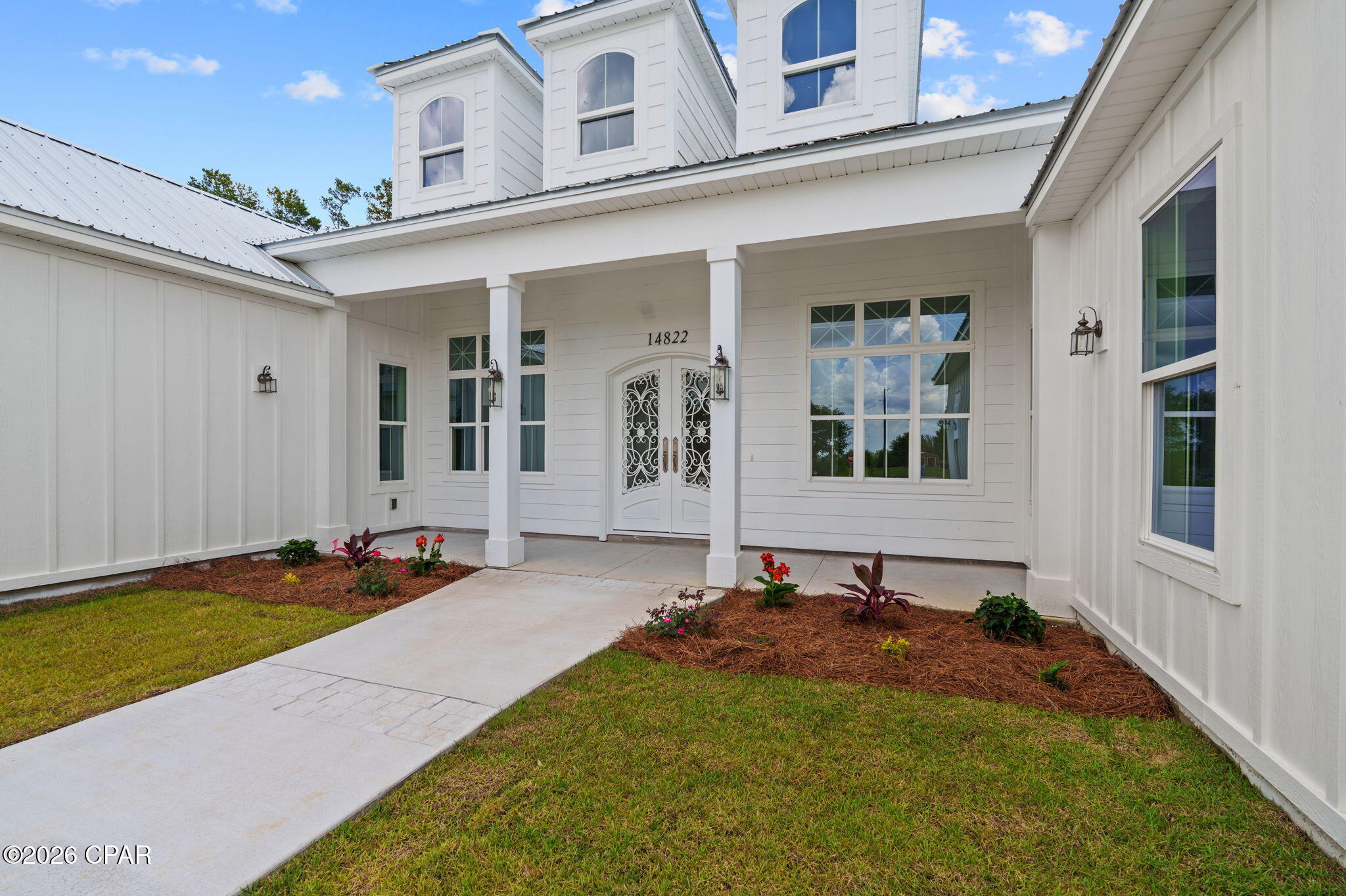 NEW CONSTRUCTION CUSTOM-BUILT PROPERTY!

Step into this stunning 2026 custom-built home, perfectly situated on a serene 1.14-acre lot in the sought-after Bream Pond community of Panama City, featuring underground utilities. Designed for modern living with timeless elegance, this 3-bedroom, 3.5-bath residence offers an open, flowing layout with exceptional attention to detail.

The home welcomes you with striking iron French double doors, leading into a light-filled living space with beautiful views of the lanai and outdoor living area.

At the heart of the home is a gourmet kitchen featuring high-end KitchenAid appliances, including a French door refrigerator, microwave/oven combination, gas cooktop, and an industrial-grade range hood. The spacious design makes it perfect for entertaining.

Sunlight fills the expansive living areas, creating a warm and inviting atmosphere throughout.

Each bedroom is generously sized, including a luxurious primary suite with spa-like features. The primary bath offers dual custom closets, dual vanities with a center seating space, and a convenient connecting door to the custom laundry room.

Enjoy the privacy and tranquility of over an acre of land--ideal for outdoor living, entertaining, or simply relaxing. The outdoor space includes two gas stub-outs for a future grill or fireplace, as well as a large storage room designed to accommodate future pool equipment. Existing pool equipment is already in place for a future pool installation.

Additional features include 8-foot arched doorways, bullnose-edge quartz countertops throughout, neutral LVP flooring, and thoughtfully selected finishes that create a cohesive and stylish design.

Key Features:

3 bedrooms | 3.5 bathrooms
2,690 sq ft living | 4,144 total under roof
Built in 2026 with high-quality, modern finishes
1.14-acre homesite
Open-concept layout with gourmet kitchen
Luxurious primary suite with spa-inspired bath
Located in Bream Pond, Bay County North

Conveniently located just 18 miles to the international airport, 25 minutes to medical facilities near Hwy 79, and approximately 35 minutes to Pier Park for shopping, dining, and beach access. Scenic 30A destinations including Rosemary Beach, Seaside, and Alys Beach are just a 45-minute drive away.

Experience the perfect blend of privacy, comfort, and modern luxury--this home is ready to welcome you.

*DISCLOSURE- AI IMAGES UPLOADED AS THE LAST FIVE IMAGES SHOWING POSSIBLE FURNITURE LAYOUT AND LANDSCAPING FUTURE OPTIONS.

*No active HOA or board. Property may be subject to recorded covenants, conditions, and restrictions. Seller and listing agent make no representations regarding permitted use. Buyer to perform all due diligence regarding restrictions, zoning, utilities, and intended use.