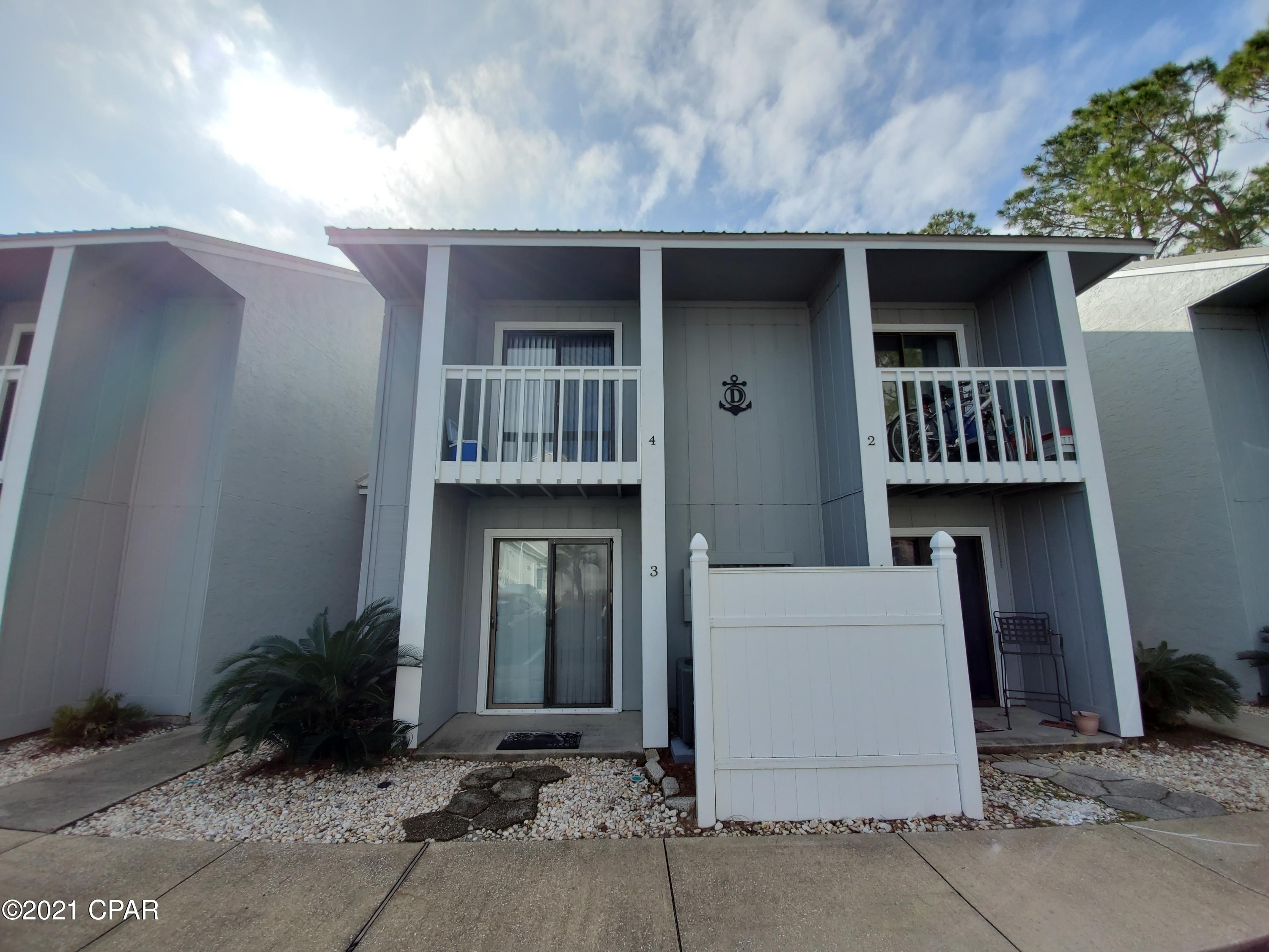 Gorgeous waterfront condo for rent overlooking Grand Lagoon! Located in the gated community of Dockside North, this second floor unit is fully furnished. It is a two-story loft floor plan with 2 bedrooms and 2 bathrooms. The main level boasts a remodeled kitchen with granite and stainless appliances. Enjoy the water views from the kitchen, living room or large balcony overlooking Grand Lagoon. Upstairs is the loft master bedroom with walk-in closet and en suite bathroom featuring jetted tub. The 2nd bedroom is on the main level and has a shared hallway bath w/ tub/shower combo. Dockside North offers a community pool, fishing dock and grilling area. All measurements are approximate. Please verify if Important.

**Pets negotiable upon approval with $250 non-refundable pet fee.