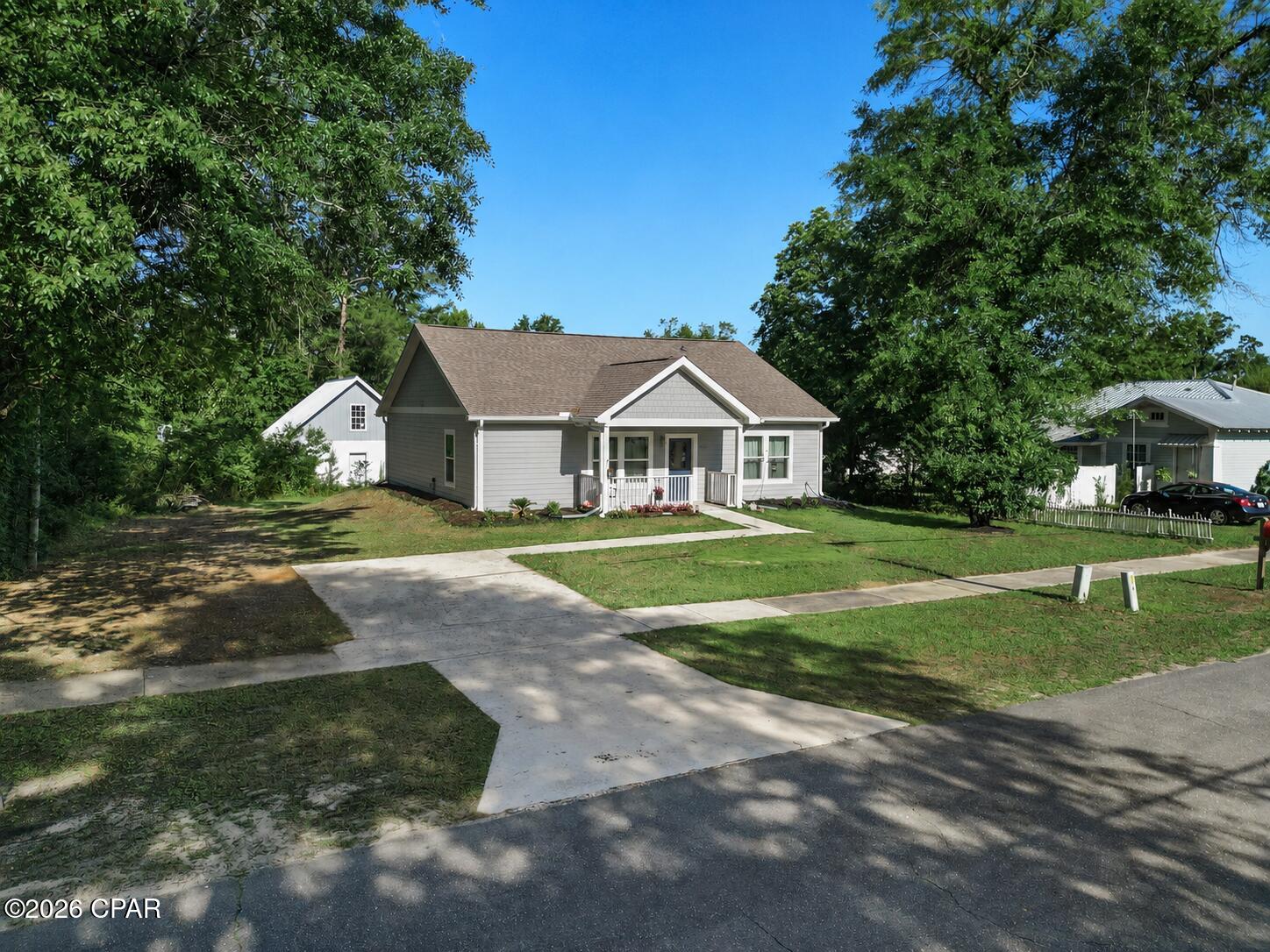 Built in 2022 and thoughtfully designed for modern living, this beautiful 4 bedroom, 2 bath home offers 1,520 square feet of comfortable living space in the heart of Blountstown, Florida. Situated on a spacious .24-acre parcel within the city limits, this property combines the convenience of town living with the charm and relaxed lifestyle of North Florida.

The home features attractive Hardie Board siding, a durable shingled roof, and a welcoming curb appeal that immediately catches the eye. Inside, you'll find a functional and inviting floor plan designed to accommodate both everyday living and entertaining. The spacious living area flows seamlessly into the kitchen and dining space, creating an open-concept atmosphere perfect for gatherings with family and friends. The split-bedroom layout offers privacy for the primary suite while providing ample space for guests, children, or a home office.

Conveniently located just minutes from the new Calhoun Liberty Hospital, local doctors' offices, schools, shopping, restaurants, and everyday amenities, this property places everything you need within easy reach. For outdoor enthusiasts, one of the area's greatest attractions is just moments away -- the renowned Apalachicola and Chipola Rivers. Whether you enjoy fishing, boating, kayaking, or simply relaxing on the water, you'll appreciate having some of Florida's most scenic natural resources nearby.

Centrally positioned within an hour of Tallahassee, Dothan, and Panama City, you're also just a short drive from the sugar-white sands of Florida's Forgotten Coast in Mexico Beach. 

Offering the perfect blend of newer construction, small-town convenience, and outdoor recreation, this move-in ready home is an exceptional opportunity for families, first-time buyers, or anyone seeking the laid-back Florida lifestyle. Measurements are approximate, verify if important.