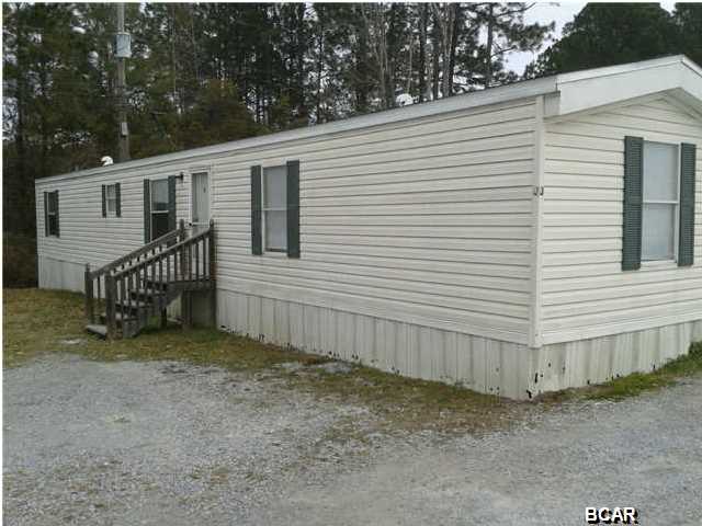 This 3 bedroom 2 bath single wide mobile home features a split bedroom floor plan providing extra privacy. Washer/Dryer hookups, central heat & air. Centrally located in Lynn Haven. Washer & Dryer included. Some pets are negotiable with a $150.00 non-refundable animal fee per animal - No dogs. *All measurements are approximate. ** Property should be available 3/23/15.