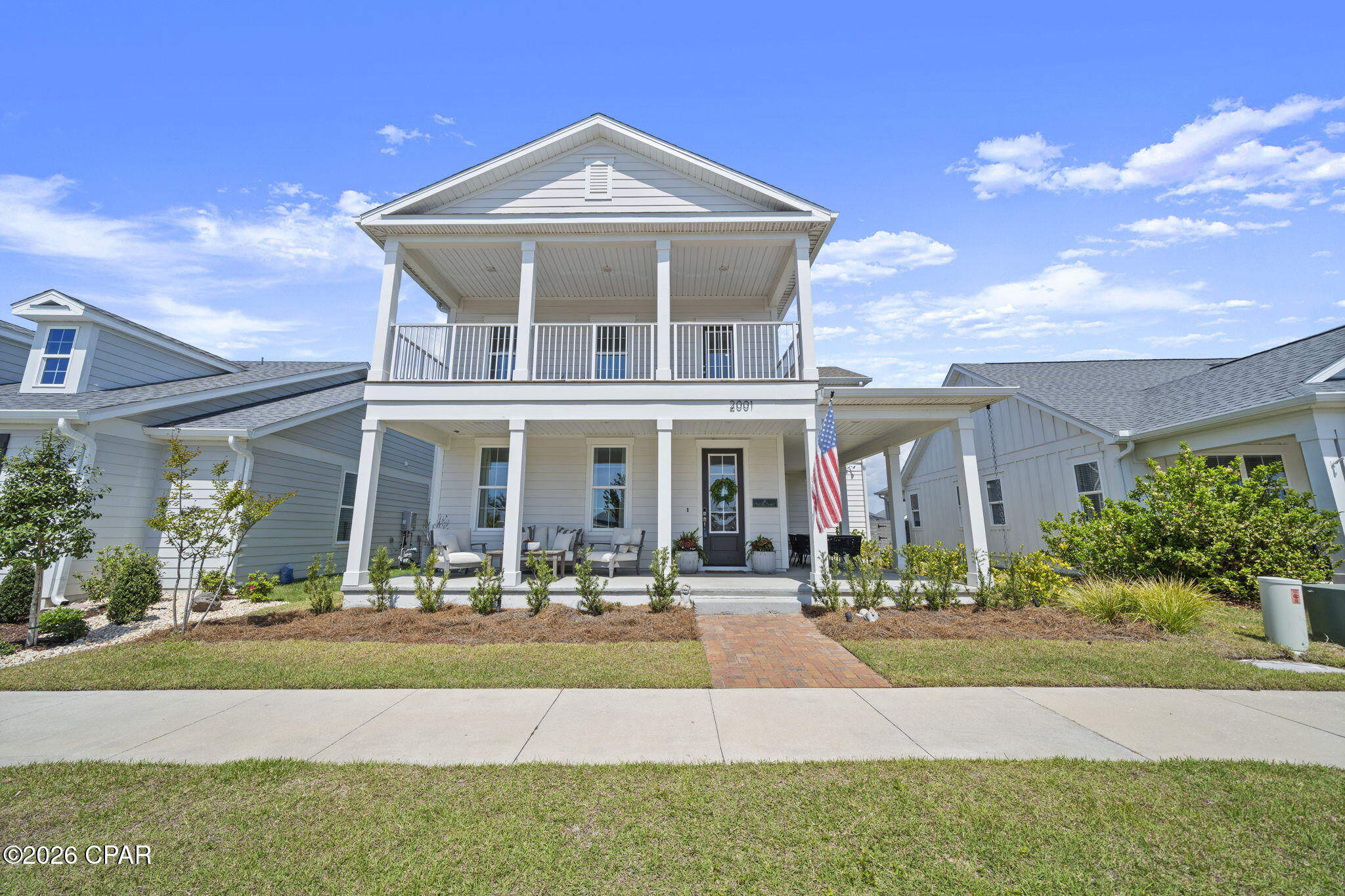 Perfectly positioned directly across from the resort-style pool at Blossom Park, this stunning 4 bedroom, 3.5 bath home offers the kind of lifestyle buyers dream about. Enjoy your morning coffee or unwind in the evenings on the spacious second-floor balcony overlooking the pool and park, your own front-row seat to one of SweetBay's best amenities. Inside, you'll find a thoughtfully designed floor plan with plenty of room to live, work, and entertain. The spacious loft with custom built-ins creates the perfect flex space for a second living area, office, or playroom. The heart of the home features a beautiful kitchen with quartz countertops, stainless steel appliances, a gas range, instant hot water dispenser at sink, and a butler's pantry. Storage is a dream with custom shelving in every closet and pantry, maximizing both function and organization. The living room is warm and inviting with a gas fireplace with tile surround. Elegant window treatments throughout add a polished move-in-ready feel. The home also features a tankless water heater, providing energy efficiency and endless hot water. Step outside to enjoy the expansive wraparound front porch that stretches along the front and side of the home--perfect for relaxing and connecting with the vibrant SweetBay community. The backyard is fully fenced with a 3 car garage and an extra paver parking pad. 

Living in SweetBay means embracing a true lifestyle. Residents enjoy miles of scenic walking and biking trails, two resort-style pools, two playgrounds, and multiple green spaces perfect for gathering and outdoor activities. Spend your weekends at the community bayfront beach, launch a kayak, or fish from the dock while taking in the beautiful waterfront views. And when it's time to run errands or grab your favorite coffee, you're just minutes from Publix, Starbucks, and a variety of nearby shopping and dining options.

This home truly checks all the boxes -- style, space, upgrades, and an unbeatable location right across from Blossom Park.