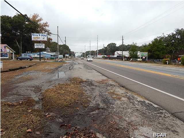 Centrally located 8+ room, freestanding building and garage with General Commercial business applications including extra 100x100 lot with 100''of Hwy 22 frontage 1 +/- block (s) off Hwy 98 in Callaway. Great application for Car dealership, thrift store, AC/Heat business, Auto Repair or any start up business that needs office, garage and plenty of parking space with easy access to major hwy. This large home/building sits on almost .65 acres with zoning that would permit a business with lots of road frontage on Hwy 22. The floor plan lends itself to easy remodel for office space that would accommodate 4+ offices, Executive Office with bath, Waiting/Reception area and full kitchen with appliances included. Since this is zoned general commercial with easy access off of 4+ lane highway.