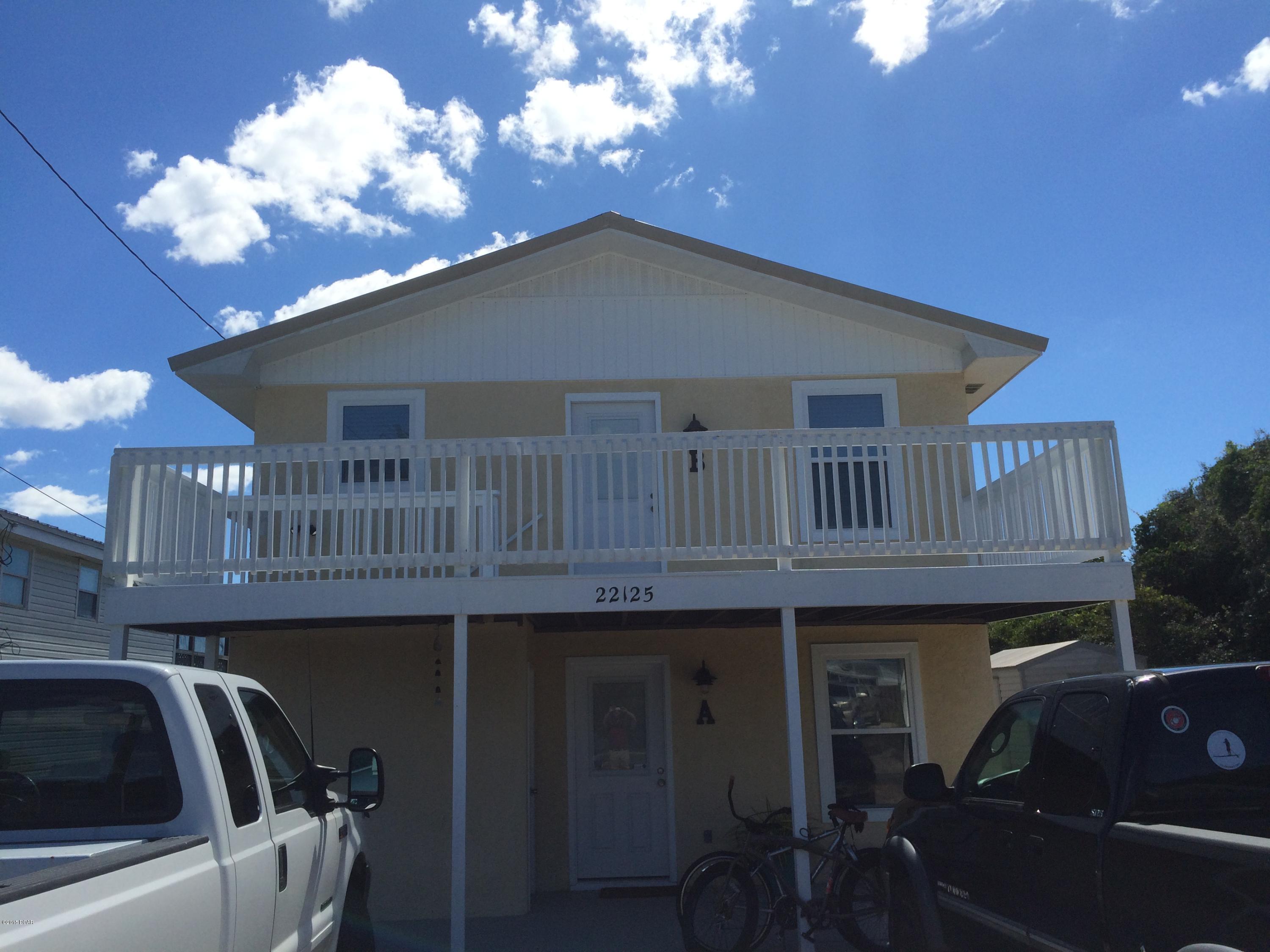 Fantastic 2 bedroom unit located on the West end of Panama City Beach with a Gulf View. This is a duplex unit - on the ground floor recently painted inside, laminate wood floors, and a large master bedroom with french doors leading to a balcony looking towards the Gulf of Mexico. There is also a nice open deck/balcony on the front. Rare find for this type of unit.