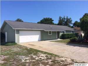 Looking for your next beach house??? Look no further. This home is close to the beach and only 1.5 miles from Pier Park. Three bedroom, two bath home with large open floor plan. Living room features tall ceilings, fireplace and French doors opening to your private pool. Home has a very large laundry room inside the garage. Home has recently been painted and new carpet throughout. New lawn pump & timer will be installed soon. This is a LIKE NEW HOME! This home is ready for a new owner. This property is eligible under the Freddie Mac First Look Initiative through 06/09/2015. During the first 20 days a home is listed for sale in the MLS, only offers from owner-occupants (primary residence), second home buyers and public entities or their designated partners will be considered. Offers