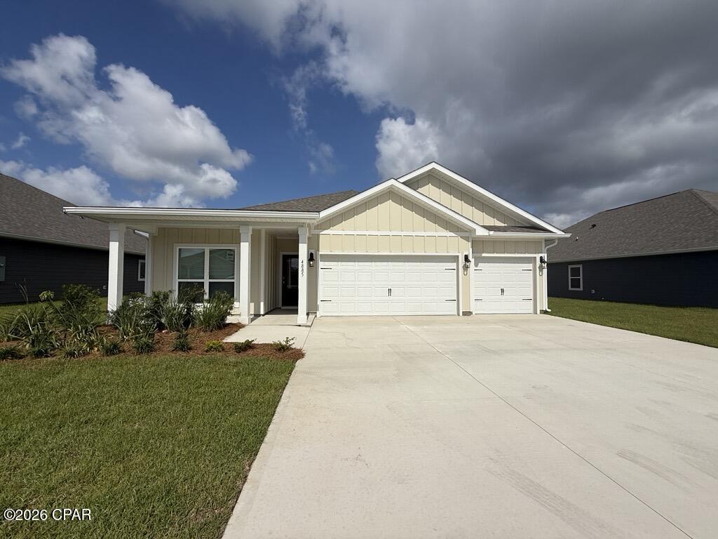 Welcome to the Madison, a new home floor plan at Titus Park in Panama City, Florida. The Madison is one of our many featured one-story homes at the beautiful Titus Park community.

When you walk into the home, you are greeted by a long hallway that is the center point for bedrooms, the laundry room and garage, and leads to the open living room and kitchen. Beautiful engineered vinyl plank (EVP) flooring lines the main areas of the house and soft carpet covers the bedrooms.

The bedroom closest to the garage also comes with its own bathroom, not shared in the main hallway. The bathrooms have beautiful white quartz countertops and white cabinets that enhance the beauty of this home.

Entering the kitchen and living room area, you will notice plenty of natural sunlight illuminating the main area. The living room has tray ceilings that open the room, making your living space feel much more comfortable. The kitchen has stainless steel appliances and comes with beautiful white cabinets. The large island has plenty of storage in it and every surface has elegant white quartz countertops. The dining area is located by the back door leading to the covered rear patio.

Walking into the large primary bedroom, you will also see tray ceilings and three windows that wash the room in natural sunlight. The primary bathroom has a spacious double vanity with white quartz countertops and white cabinetry. The walk-in closet is in the bathroom as well, perfect for when you get out of the separate tub or shower with glass doors.

Appreciate the convenience of a Smart Home technology package, featuring keyless entry and an intuitive control panel for your thermostat, lighting, and security systems. The exterior of this home features Hardie Color Plus Siding and is uniquely engineered to stand up to the harshest elements from wind, rain, fire, freezing temperatures, and hail. Dimensional shingles with 30-year warranty. A landscaped front flower bed at entry way and fully sodded yard. Our Titus Park community features underground utilities making it less susceptible to damage from severe weather leading to fewer outages and more reliable service. Residents of Titus Park can enjoy exclusive access to the newly built amenity center with a pool, BBQ pits and lounge chairs!

The Madison is a favorite choice among buyers in Titus Park. Stop by the model home today to see for yourself and find your next home at Titus Park in Panama City!