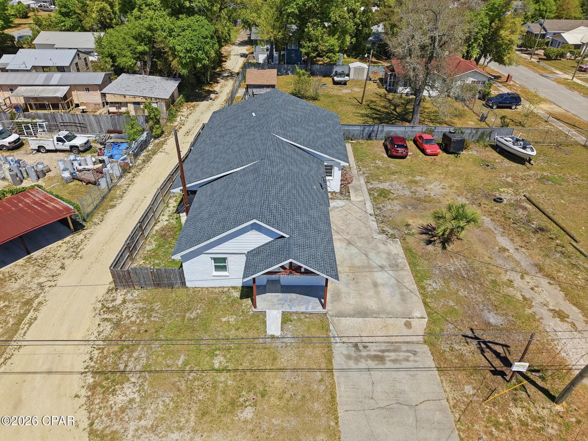 Investment Opportunity on 100x160 corner lot in Downtown Panama City!
This versatile property is divided into three separate units and offers excellent income potential. It is centrally located near downtown Panama City dining, and shopping. Situated on a large lot with a huge side yard, there's ample space potentially for expansion, additional amenities, or future development.
The property features:
• Unit 1: 2 bedrooms, 1 bath 
• Unit 2: 1 bedroom, 1 bath 
• Unit 3: 3 bedrooms, 2 baths 
Seller says current rental income - Unit 1 renting for $1,500/month, Unit 3 for $2,000/month, and Unit 2 previously renting between $500-$700/month--bringing total potential income to over $4,000 per month.
Live in one unit and rent the others or maximize returns by leasing all three--flexibility makes this property ideal for both investors and owner-occupants.
Extensively updated in 2022, including new kitchens, bathrooms, flooring, roof, and more, this property is move-in ready and positioned for immediate cash flow.
All measurements are approximate and should be verified by buyer.