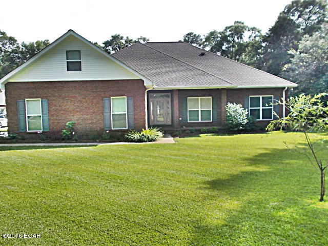 PRICE REDUCTION!! Executive home in Indian Springs,very private and secluded, fenced with electric gate at entrance,2.97 ac.and security system. Large open living room,wood flooring, 10 ft ceilings and crown molding.Tile floors in foyer, baths, kitchen and utility room. Built in entertainment center houses surround sound system, speakers in living room, master bedroom, bath, dining room, and back lanai. Lots of natural light from windows overlooking the pool, open kitchen has new gas cook top, hood, sink faucet, double elec. ovens, granite counter top and maple cabinets, with a built in computer area in breakfast room.Large master bedroom with large master bath walk in closets, large tub, double sinks with extra height to granite counter tops and double closets,