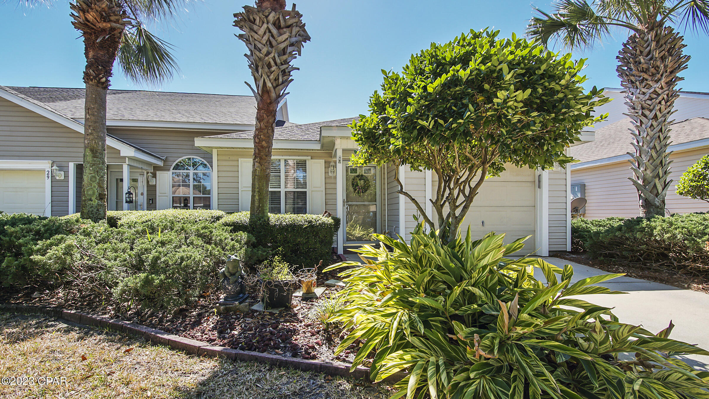 Fully furnished 2 bedroom/2 full bathroom townhome in PCB. Townhome can come unfurnished for $2300 a month! You'll love the space in this townhome & the very functionable floor plan! As you walk in you love the spacious living room. Plenty big enough for a couch, loveseat & more. The kitchen is a dream with breakfast bar, lots of cabinets, room for a dining table & built in desk area. The main bedroom features it's own bathroom & nice walk-in closet. Outside features a screened in patio, beautiful landscaping. Community offers a nice community pool and sidewalks. Only 5 minute gulf cart ride to the beach, shopping, dining, entertainment and more!