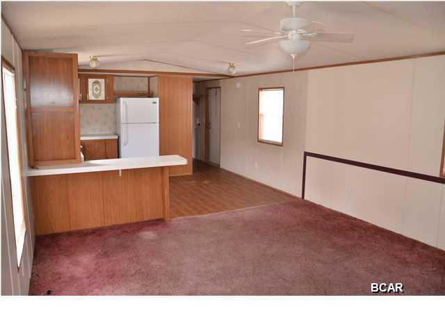 2 bedroom 1 bath single wide mobile home, open floor plan, washer/ dryer hook-ups. Centrally located in Lynn Haven. Some pets are negotiable with a $150.00 non-refundable animal fee per animal - No dogs. *All measurements are approximate.