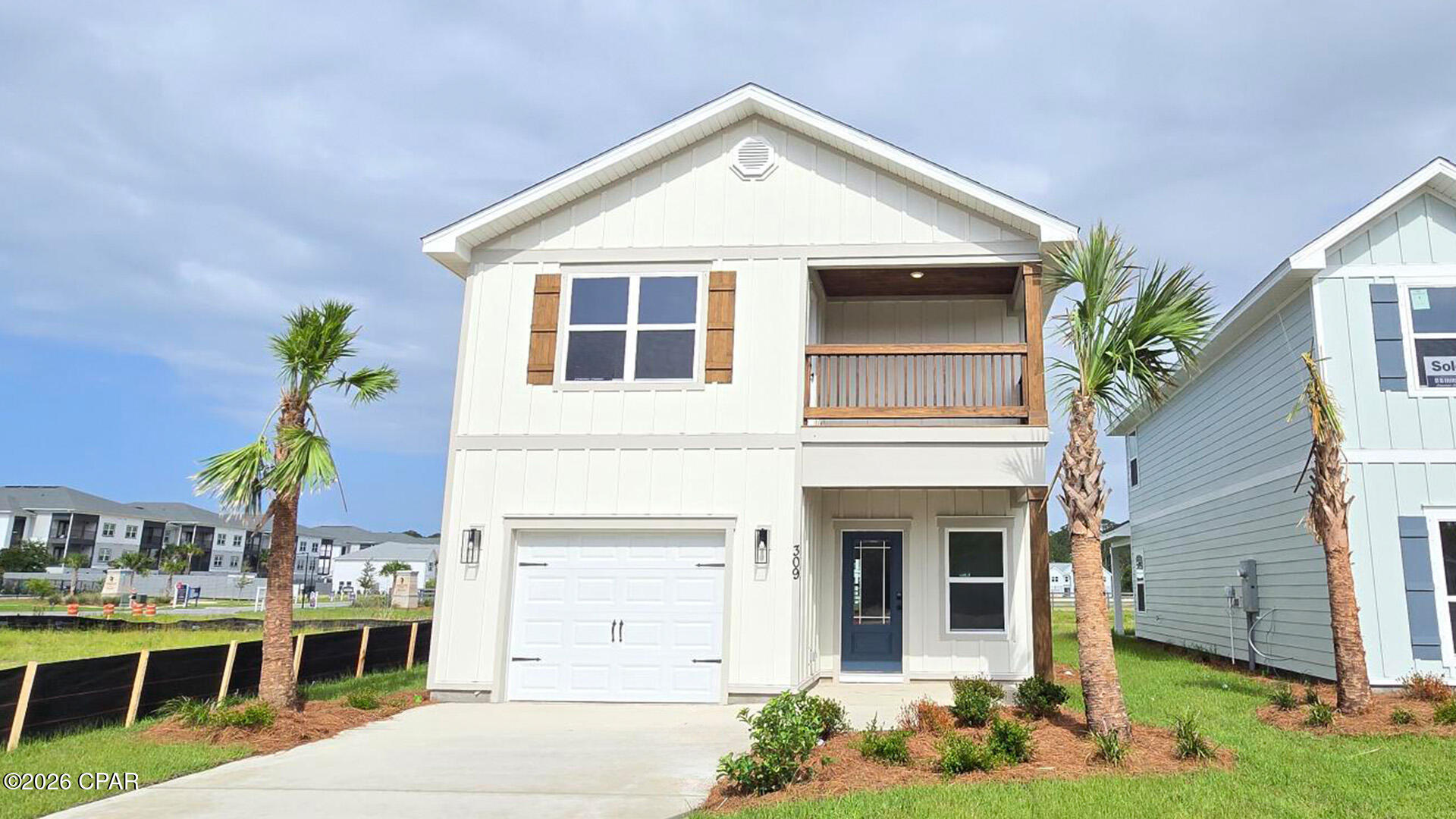Welcome to 309 Robinson Bluff Road, a new home located in Colonial East in Panama City Beach, Florida. This home is ready for move in and is centrally located in Panama City Beach.

Entering the home, you will find an entry hall leading to a grand living space on the main level. The open concept design of the main living area features a kitchen with peninsula bar that has pace for seating. Traditional 9' ceilings grace the living area which opens to the covered back porch. The main level serves as the heart of the home with plenty of space. The interior of this home will include elegant features with a modern flair including a tile backsplash in the kitchen and quartz countertops, EVP flooring throughout creating a seamless transition between rooms. The kitchen is equipped with stainless appliances including a smooth top stove, microwave and dishwasher.

Upstairs you will find all bedrooms and a landing with laundry area and shared bathroom. The Primary bedroom is located overlooking the front lawn and has a private ensuite bathroom. Two large closets are located in the primary bedroom and offer plenty of space for your wardrobe needs. The primary bathroom has the feel of a private oasis with a large soak tub and a separate tile shower with glass enclosure. The dual sink vanity offers lower cabinetry for storage. Enjoy a quiet evening on your covered balcony located off the primary bedroom.