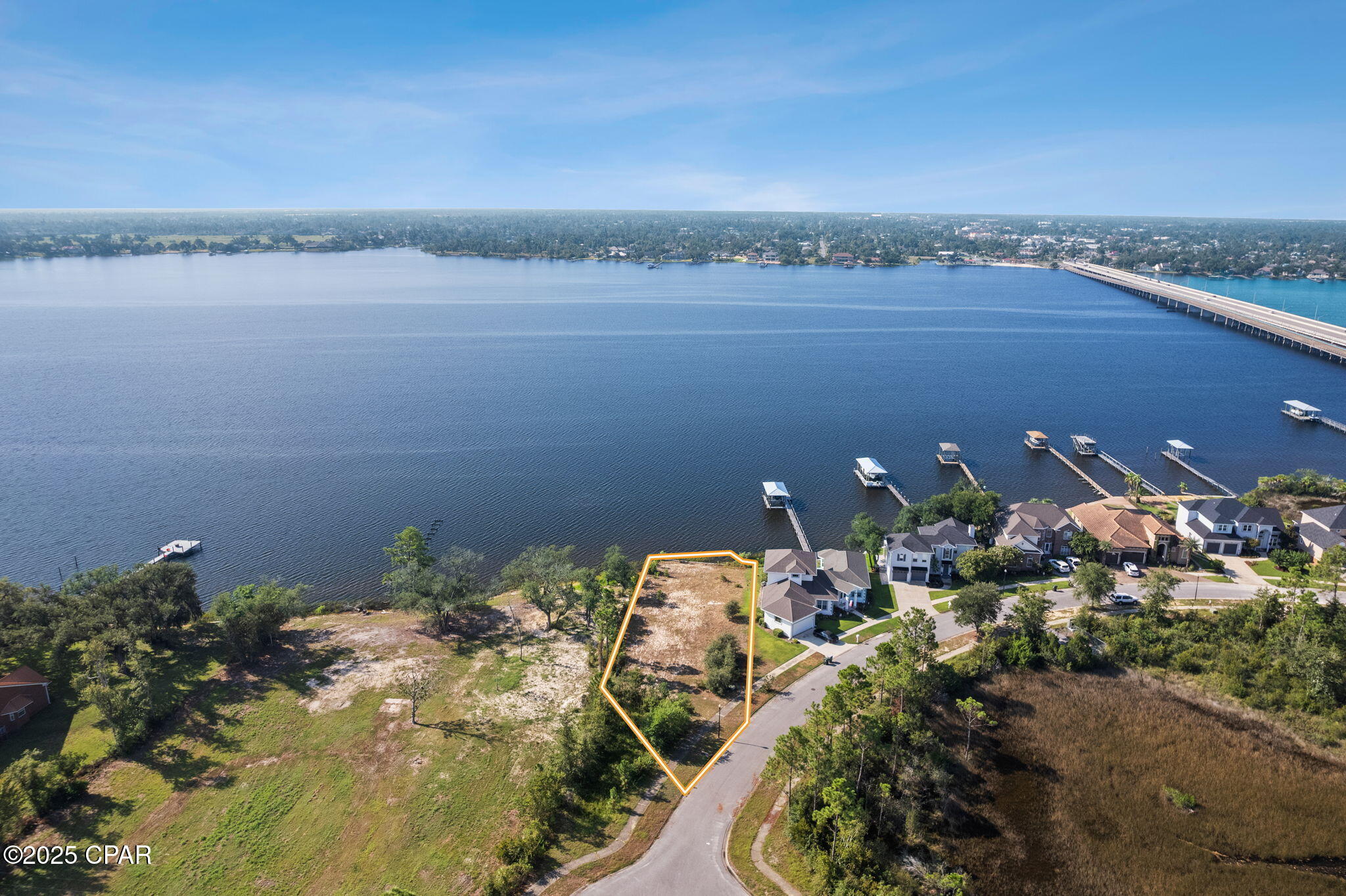 Discover an extraordinary opportunity to create your DREAM waterfront home overlooking the North Bay. This finished and cleared homesite promises boundless potential for designing a custom residence that captures the essence of luxury and tranquility. With expansive views that stretch across the water, your future home could be a true oasis.

Nestled in the quiet community of Mill Point Landing, this property offers not only breathtaking water views but also convenience and accessibility. The property is also a few minutes' drive from some of the BEST restaurants in town!

The potential for this land is limitless, whether you envision a sprawling contemporary home with floor-to-ceiling windows to maximize the views or a cozy retreat, perfect for relaxing and unwinding. The lot already has a seawall in place and recent survey done.  All measurements are approximate and should be verified by the buyer if important. 

These gorgeous panoramic views of North Bay could be YOURS! This beautiful lot is ready for your Dream Home!