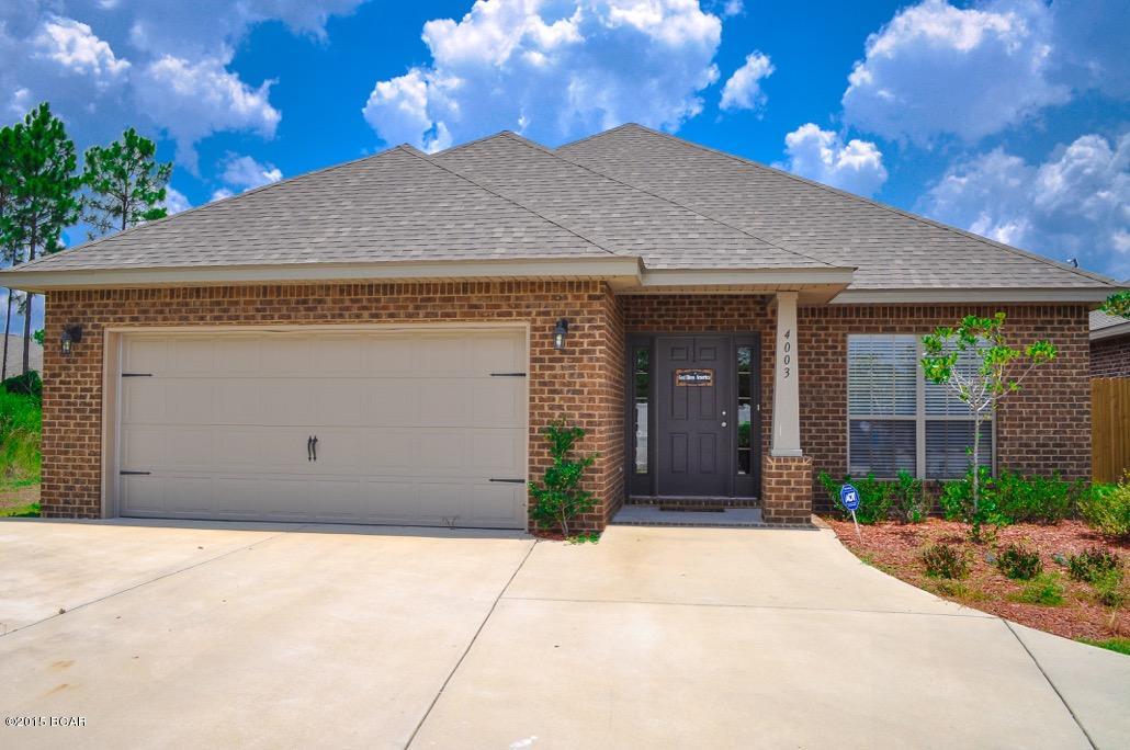 This beautiful brick home is located in the popular Plantation Park neighborhood on a cul de sac. This spacious, split bedroom home features 3bd/2ba plus a formal office/dining room with hardwood floors. The large gourmet kitchen boasts an island, tiled floors, granite countertops, stainless steel appliances, and a eat in breakfast area. The large family room has beautiful hardwood floors, a trey ceiling and overlooks the backyard with covered patio. The master bedroom with trey ceiling is spacious, private, and adjoins a luxurious master bath with separate shower, garden tub, large walk in closet, and double granite vanity. The second and third bedrooms each have a walk in closet. This outstanding home is serviced by top Bay County schools.
