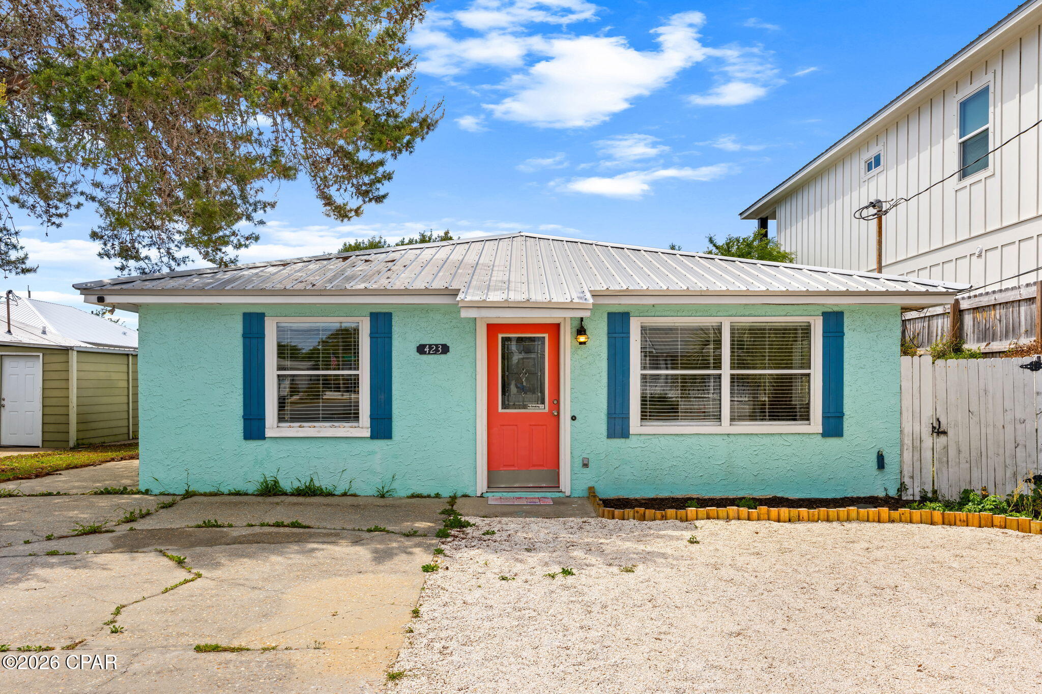 Back on the market--no fault of the seller--offering a second chance to secure this incredible beach investment opportunity. Located just a few blocks from the Gulf on the highly desirable west end of Panama City Beach, this updated coastal bungalow is perfectly positioned for both personal enjoyment and short-term rental income. Featuring new LVP flooring, fresh interior paint, expanded driveway for additional guest parking, and a low-maintenance backyard, this home is designed for ease of ownership and strong rental performance. The fully fenced yard includes a detached storage building with potential to convert into a charming bonus space (buyer to verify) and offers room to add a pool for additional income upside. Professional rental projections estimate approximately $62K-$88K in annual gross revenue with strong occupancy potential. Ideally located near public beach access, the Rosemary Beach entrance to 30A, and Pier Park. Opportunities like this don't come around often--especially at this price point.