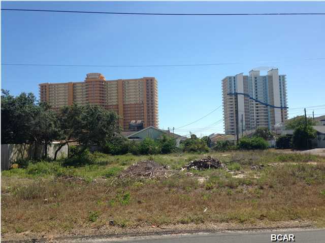 GREAT building lot and amazing location in Lower Grand Lagoon!! You can build a single family residence or multi-family residence on this cleared, corner lot. Zoned for up to 3 units. Make income from one side of a duplex and live in the other, or rent both sides. You should be able to have a gulf view with a 2 or 3 story building. Tons of potential! Within walking distance to beach public access and to local restaurants. You're close to several marinas and boat ramps. Survey is available. Public sewer is available on this lot. Seller is a Licensed Florida Realtor.