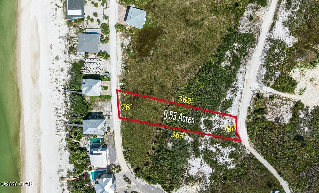 This is a rare chance to own over half an acre in the highly sought-after North Cape. The lot offers both Gulf and Bay views, with deeded beach access just a short walk away! Perfect for morning beach walks or sunset views. Located right next to St. Joseph Peninsula State Park, you'll have endless outdoor adventures at your fingertips. Spend your days hiking the trails, shelling along quiet beaches, kayaking the clear Bay waters, or casting a line and watching the wildlife. It's a peaceful, laid-back setting that truly captures the coastal lifestyle. Build the beach home you've been dreaming of and enjoy nature, privacy, and beauty all in one place.