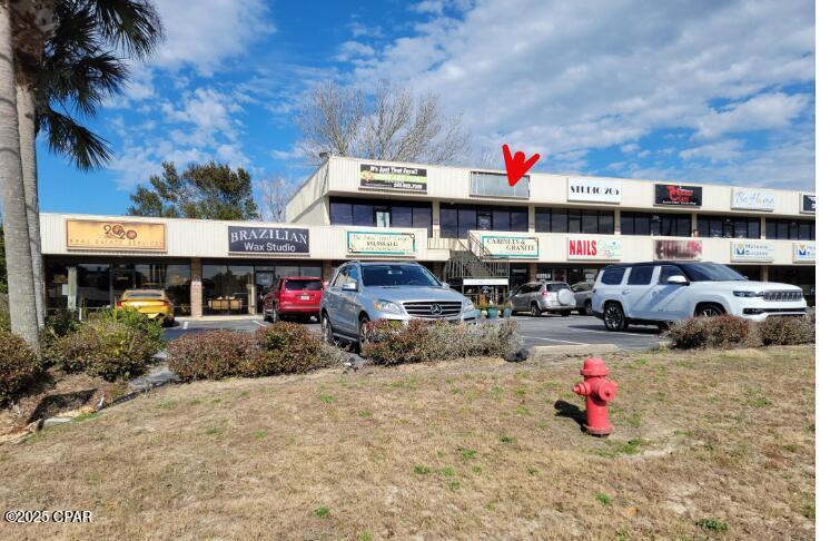 Introducing an ideal office space at Panama Plaza, with new A.C. unit, strategically located on highway 98, just 3/4 miles West of HWY 98 and 79 Intersection. This spacious second floor high visibility office features a kitchen, a separate sink, bathroom, and a versatile storage area that converts into another office. The benefits of high ceilings, providing a spacious and dynamic work environment for your business needs. Lease this office space with a competitive rent, inclusive of trash and water. Tenants only cover electricity, phone, and internet expenses.

Don't miss out on this cost-effective opportunity for a well-equipped office. Enjoy the convenience of a 20-minute drive to the International Airport (ECP) and a quick 15-minute drive to the beach. The diverse range of businesses in the plaza provides various services.
The diverse range of businesses in the plaza provides various services and ample parking spaces make it hassle free for your clients. Seize this fantastic opportunity at a very reasonable price!