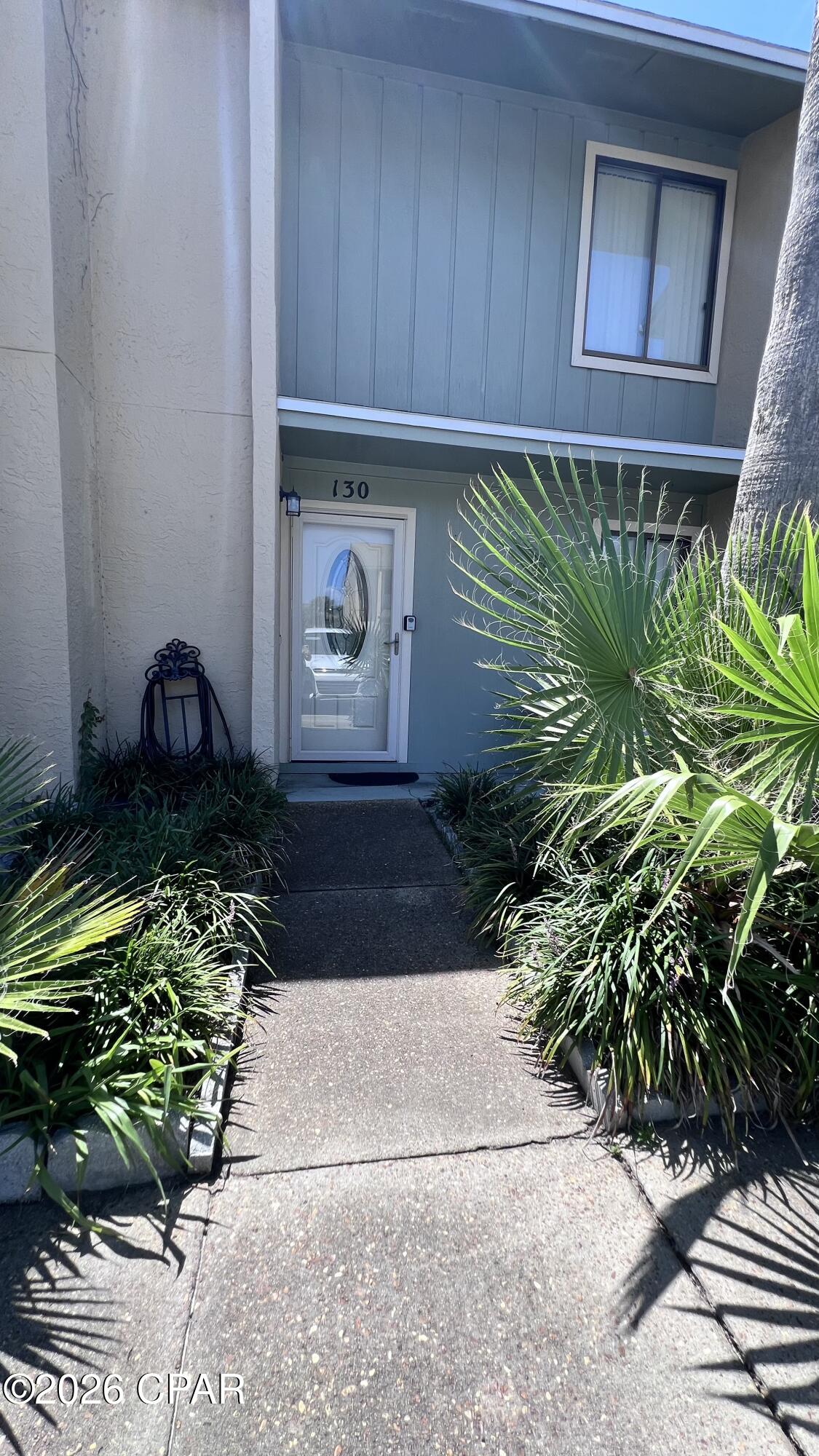 GLASSBACK PRICED TO SELL, price reflects! This unit is a clean 2 bedroom and 2.5 bathrooms glass back unit in Gulf Highlands Beach Resort located on Panama City Beach, Florida. This 1,116 sq ft. unit comes fully furnished, has a 2019 Roof, Large Poured concrete back patio, and a newer $10K custom Glass Sliding door and frame. At this price, you can transform this unit into your next Investment Property into a rental machine or design the dream home you have been wanting or your home away from home to come and relax. Gulf Highlands Beach Resort is a sought-after complex. It's location is right in the hub of the Beach and offers great amenities including 11 pools (5 heated), an 18-hole mini putt-putt golf, tennis/pickleball courts, shuffle ball courts, 2 play areas, golf cart parking near the beach house and near other amenities, Private Beach House with private pool/Cafe/Bar with an upper deck to chill and watch the sunset, you also have a private beach access with restrooms, work out room, conference center, Grand Island Club House, and this complex is a gated community that allows pets, short term rentals, and owner are allowed to have golf carts. This townhome is fee simple, and the unit comes with two deeded parking spots.  Gulf Highlands Beach Resort has low HOA dues of $1,121.78 quarterly and is in walking distance to shoppes, restaurants, entertainment, post office, storage units, ER Department, grocery stores, banks, and of course the beach. The complex has walk gates throughout the property. Contact me to schedule a tour or send info to you. If the Age, square footage and dimensions are approximating - potential buyer should verify specifics if important.
