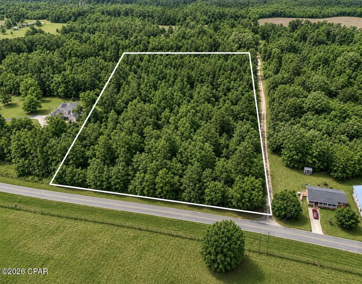 Discover the potential of this 7-acre wooded tract in Sneads, Florida, offering privacy, natural beauty, and excellent road frontage near the corner of Falcon Rd and Gulf Power Rd. This property features a peaceful rural setting with mature trees throughout, making it ideal for a private homesite, weekend getaway, mini-farm, or recreational retreat.

The land is reported to be flat, dry, and free of wetlands, with utilities available in the area. With approximately 1,000+ feet of road frontage, the parcel offers convenient access and flexibility for future use. Enjoy the country feel while still being within reach of town amenities,, and major routes. NO HOA, NO RESTRICTIONS

Bring your vision and make this versatile acreage your own. Buyer to verify zoning, utilities, access, building requirements, and intended use with Jackson County.