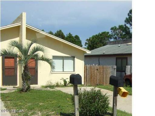 This unit has ceramic tile, new carpet in bedroom.  Fenced backyard. Room sizes are approximate