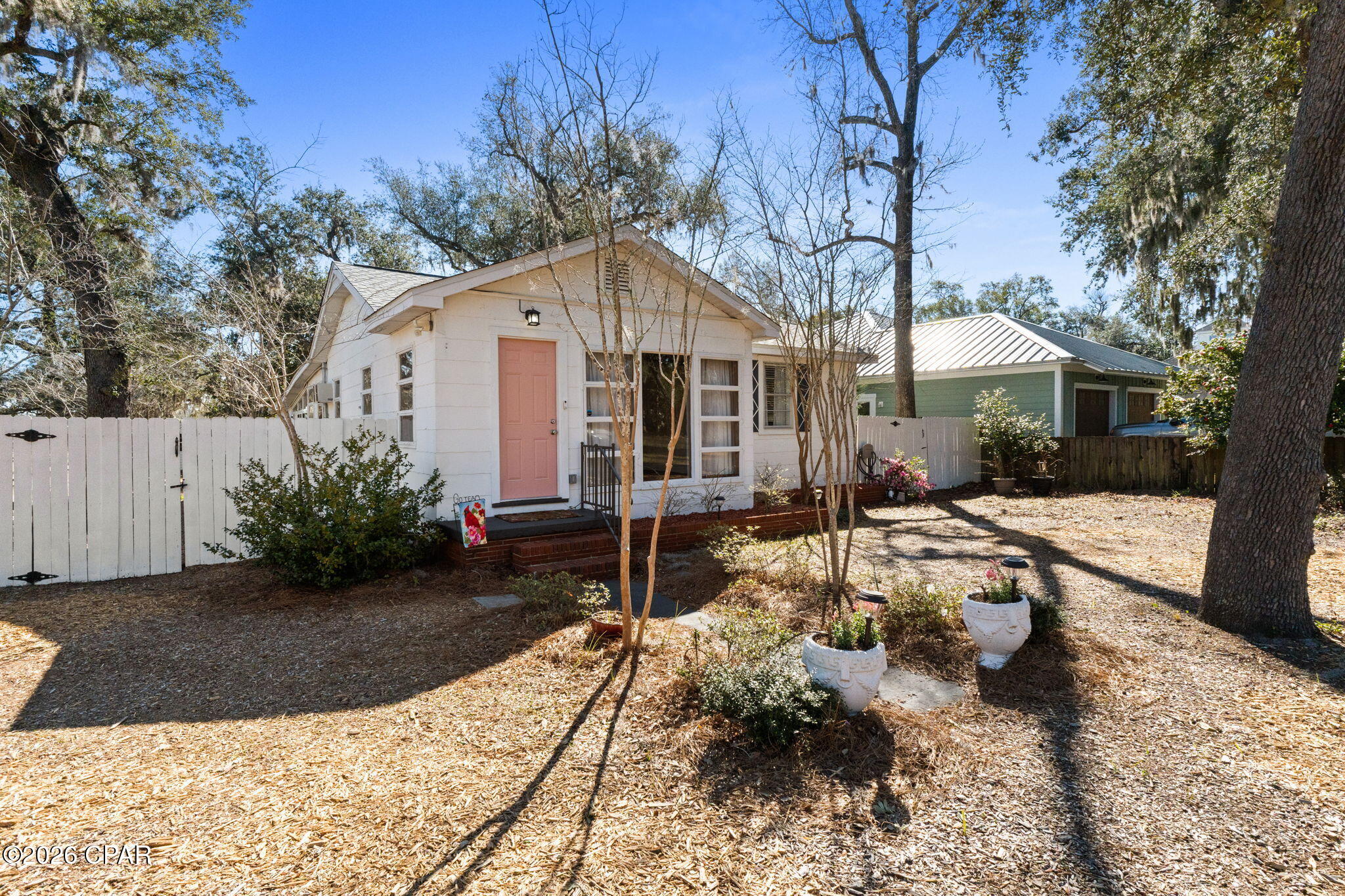 ''Back on the market with No fault of the owner ,''Sellers offering $5K toward buyer closing costs or interest rate buy-down with accepted offer approval, plus a one-year home warranty.

Located in historic St. Andrews just one block from the bay, this spacious home features a flexible 3-bedroom layout with a private guest suite and exterior entrance, plus a flex room with closet that can serve as a 4th bedroom.

Major updates include plumbing, electrical, and a newer roof. Natural gas features include a gas stove, heating, dryer, and tankless water heater. The enclosed sunroom adds extra living space, and the home has weathered multiple hurricanes.

Walk to the marina, restaurants, shops, and waterfront sunsets under moss-draped oaks. Conveniently located near the Hathaway Bridge, Panama City Beach, the Navy base, Tyndall Air Force Base, and Gulf Coast State College.