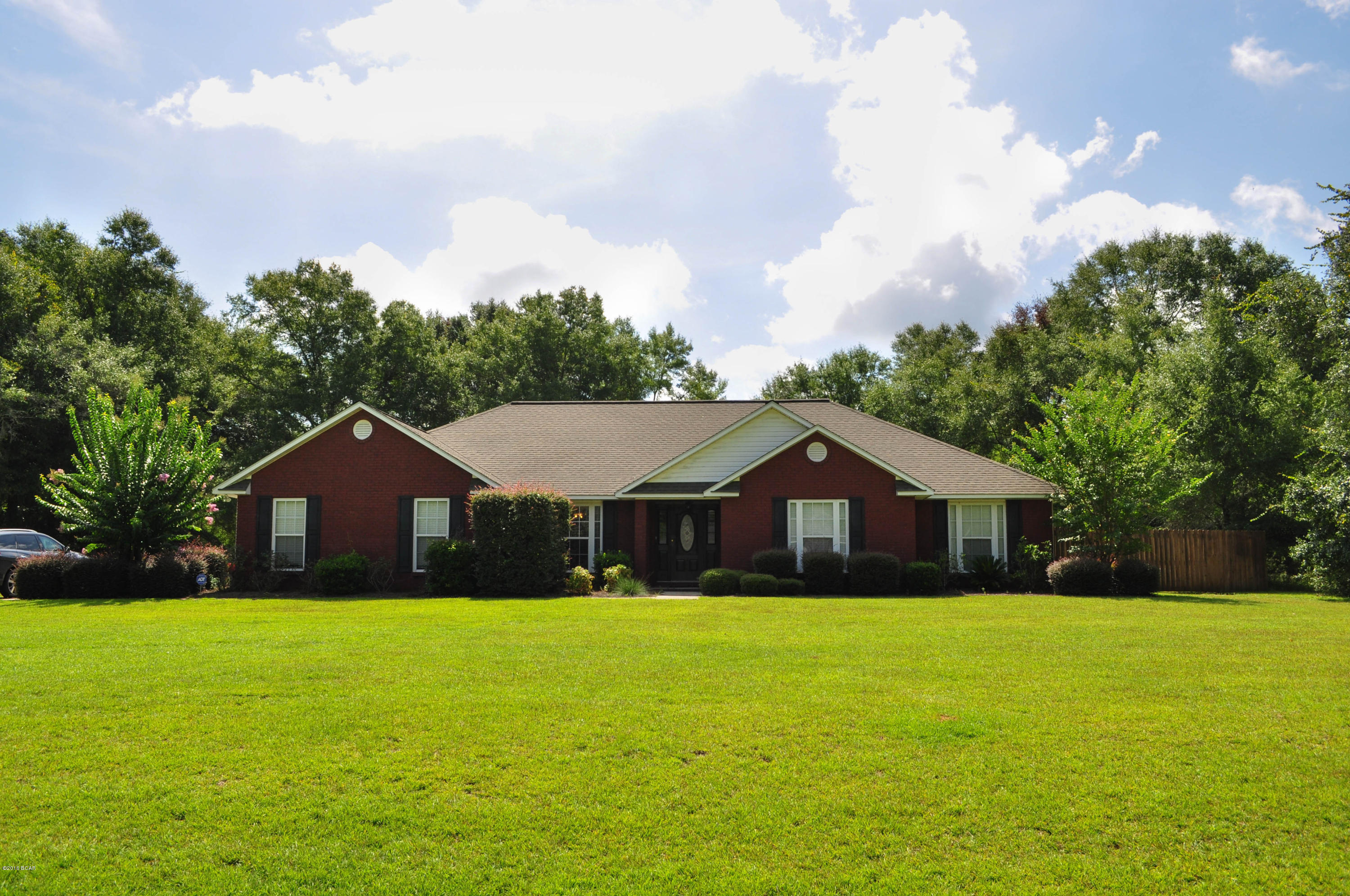 Beautiful 4/2 in Indian Springs on the Golf Course. Enjoy you beautiful fenced back yard with a pool and hot tub combination. Split bedroom design, granite kitchen counter tops, dining room, big great room, large laundry room with washer and dryer included. Enjoy your screened in patio with area for cookouts! This home on the Golf Course is beautifully landscaped. Large 2 car garage. This home is a must see! Call for an appointment today!