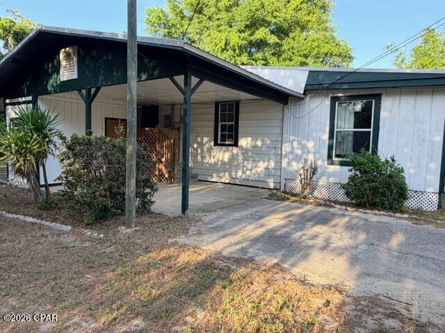 Investors Welcome!   Here's a great opportunity to own your own home, close to great schools, on over 1/3 acre.  This is a 2 bedroom, 2 bath, built in 1956 with new breaker box.  The lot is fenced, front and rear, with a concrete covered patio on the rear of the home and an enclosed front porch on the front of the home, in addition to the heated and cooled square footage.  A carport provides covered parking and there is an unfinished storage room attached.  This property qualifies for FHA 203K insured loan, w/repair escrow, AND $100 DOWN PROGRAM.  (Buyer to verify all info, measurements, schools, etc.  All  listing info is approximate.)
