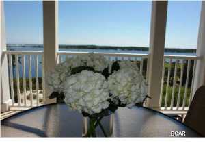 Style and class are what best describes this fully-equipped condo overlooking Grand Lagoon and St Andrews Bay. This picturesque setting comes with views of the Golf Course, St Andrews State Park, Shell Island, and the Pass. The views from this condo are absolutely amazing! Take the elevator down to the 25,000 square foot full-service Serenity Spa and Salon or take a dip in the incredible 10,000 square foot tropical resort pool with private beach area. Located in the peaceful area of Bay Point with only an 8 minute drive to the Strip of Panama City Beach. Bay Point is an upscale gated community with 4 on-site restaurants, 36-holes of championship golf, on-site marina, tennis, and spa. Make an appointment to view this unit today! All info measurements are approximate and must be verified.