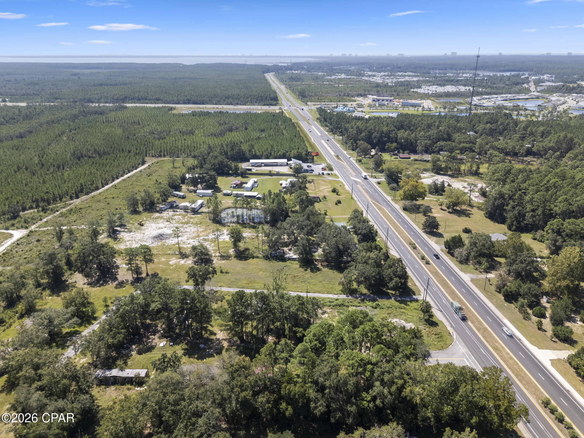 ***4.3 ACRES OF PRIME REAL ESTATE PERFECTLY SUITED FOR A SFH OR TOWNHOME SUBDIVISION, HOTEL, COMMERCIAL BUILDING, SHOPPING CENTER, ETC. YOU NAME IT, YOU CAN BUILD IT!!!*** Besides being across the street from Margaritaville, plans are in the works for a new home community directly behind it that will add an additional 2000+ single family homes. This prime location is less than a 10 minute drive from both the airport and our beautiful white sand beaches. All information is approximate and should be verified by buyers if important