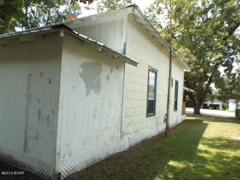 Three bedroom two bathroom home with a metal roof, on highway 231 near Waller elementary offered as is.  The property has a shed and large oak tree in the front.  The inside  has been white boxed and the inside it ready for the cabinets, fixtures, appliances and finishing touches that make the house a home.  All sizes are approximate or taken from other sources please verify accordingly.
