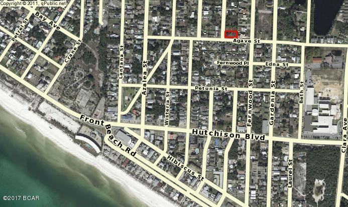 Vacant CORNER lot in a great location on Panama City Beach. Great lot for building with lots of new construction in the area. Close to beach and shopping!